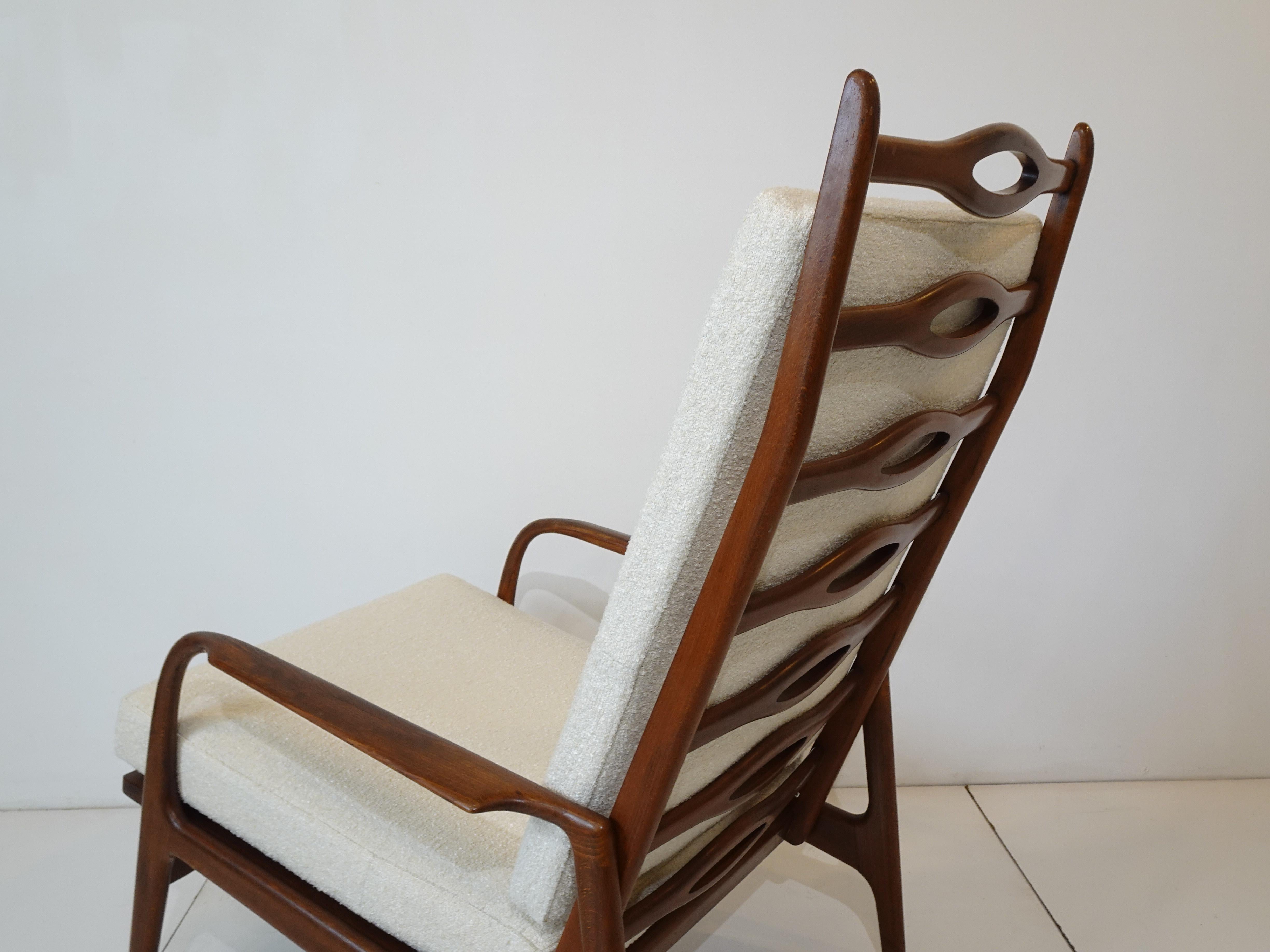 20th Century Johannes Anderesn styled Walnut Framed Lounge Chair with Boucle Fabric For Sale