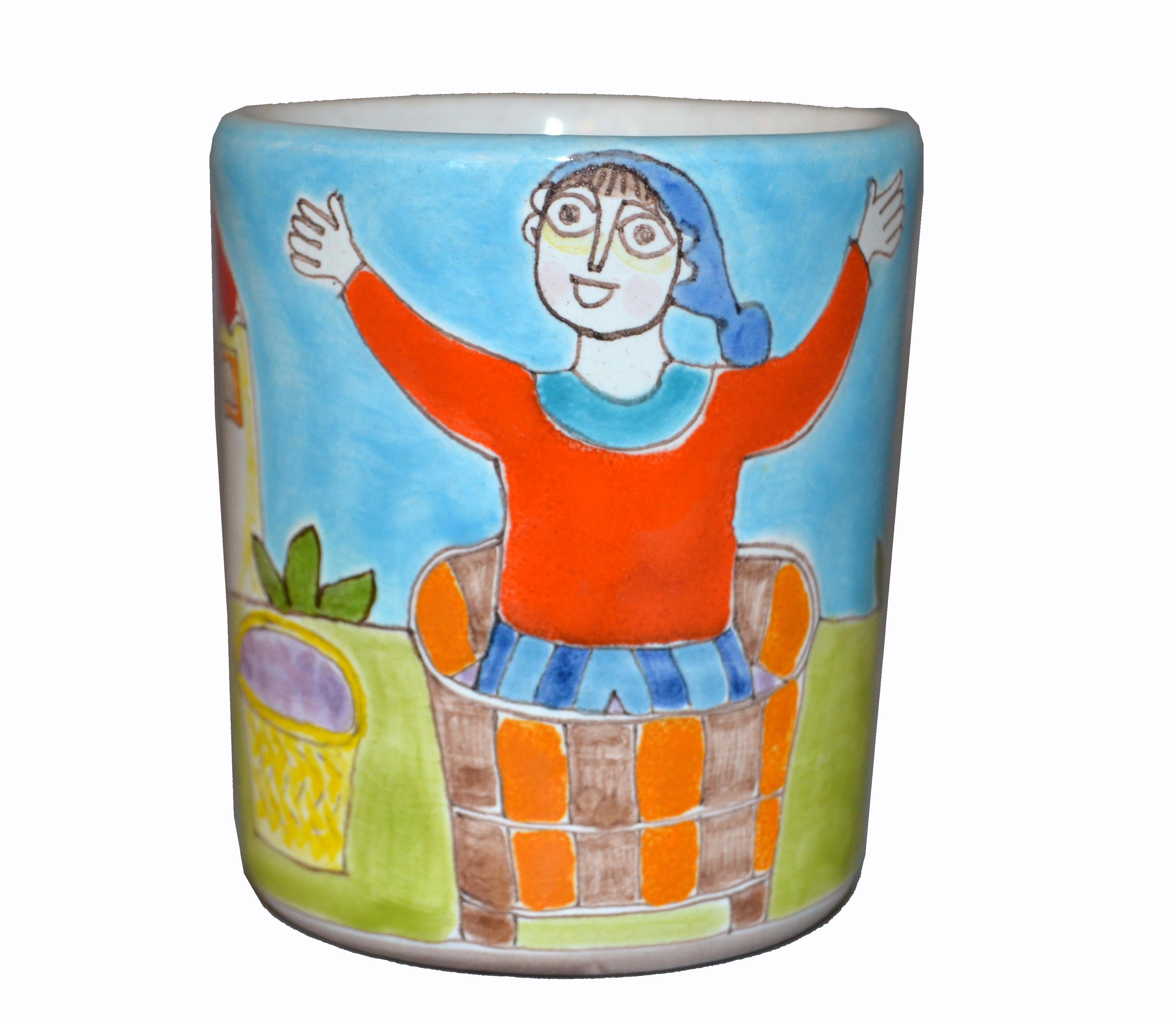 Original Italian Giovanni DeSimone hand painted art pottery, decor mug or cup with a scene of a Grape Stomper in front of his house.
The mug is glazed and very colorful.
DeSimone mark and numbered on underside, 'DeSimone, Italy 20, Art.108'.
  