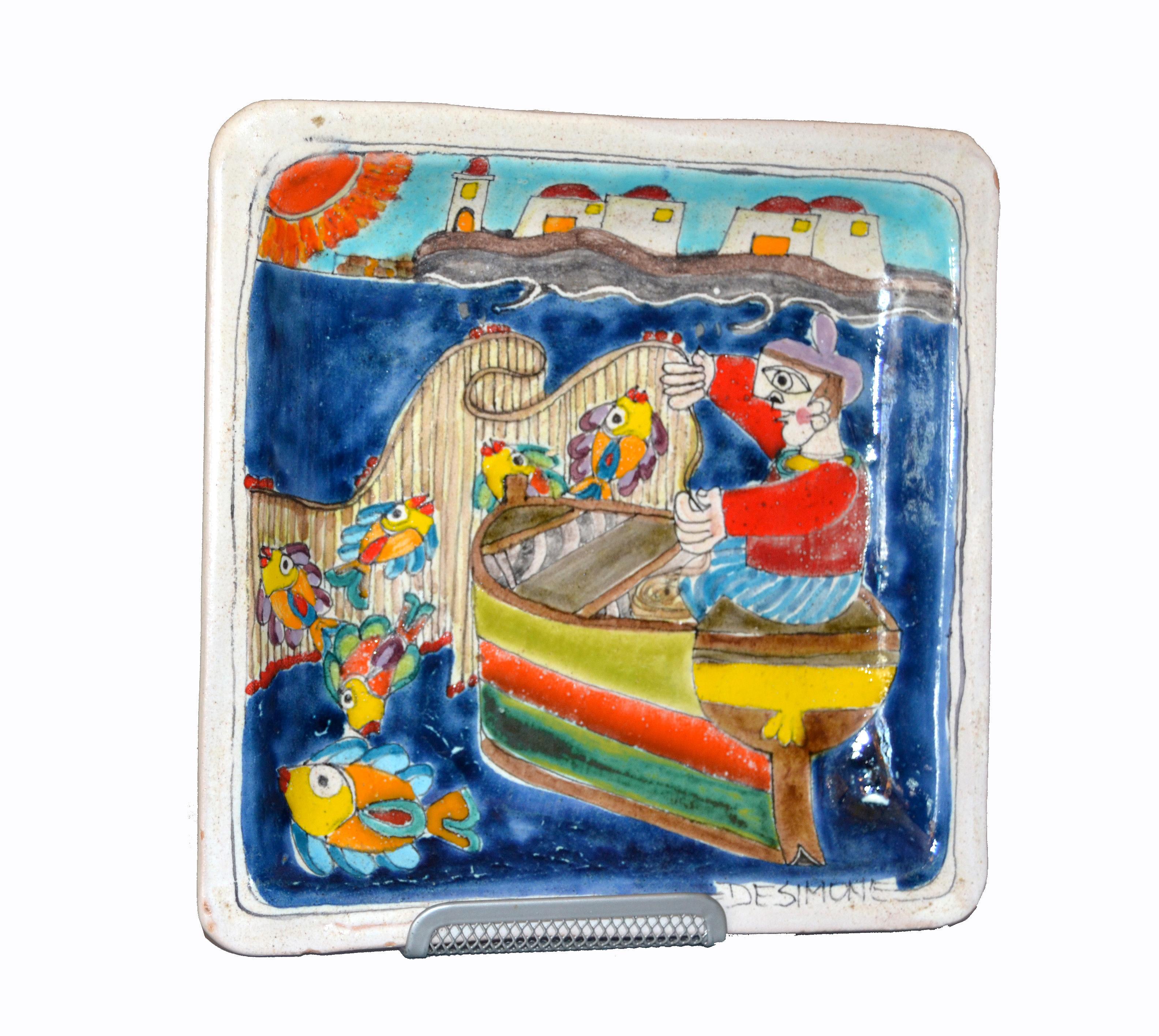 Original Italian Giovanni Desimone hand painted art pottery, square decor plate with a scene of a fisherman casting his net.
The plate is glazed and very colorful.
Makers Mark at the right corner as well as marked and numbered on underside,
