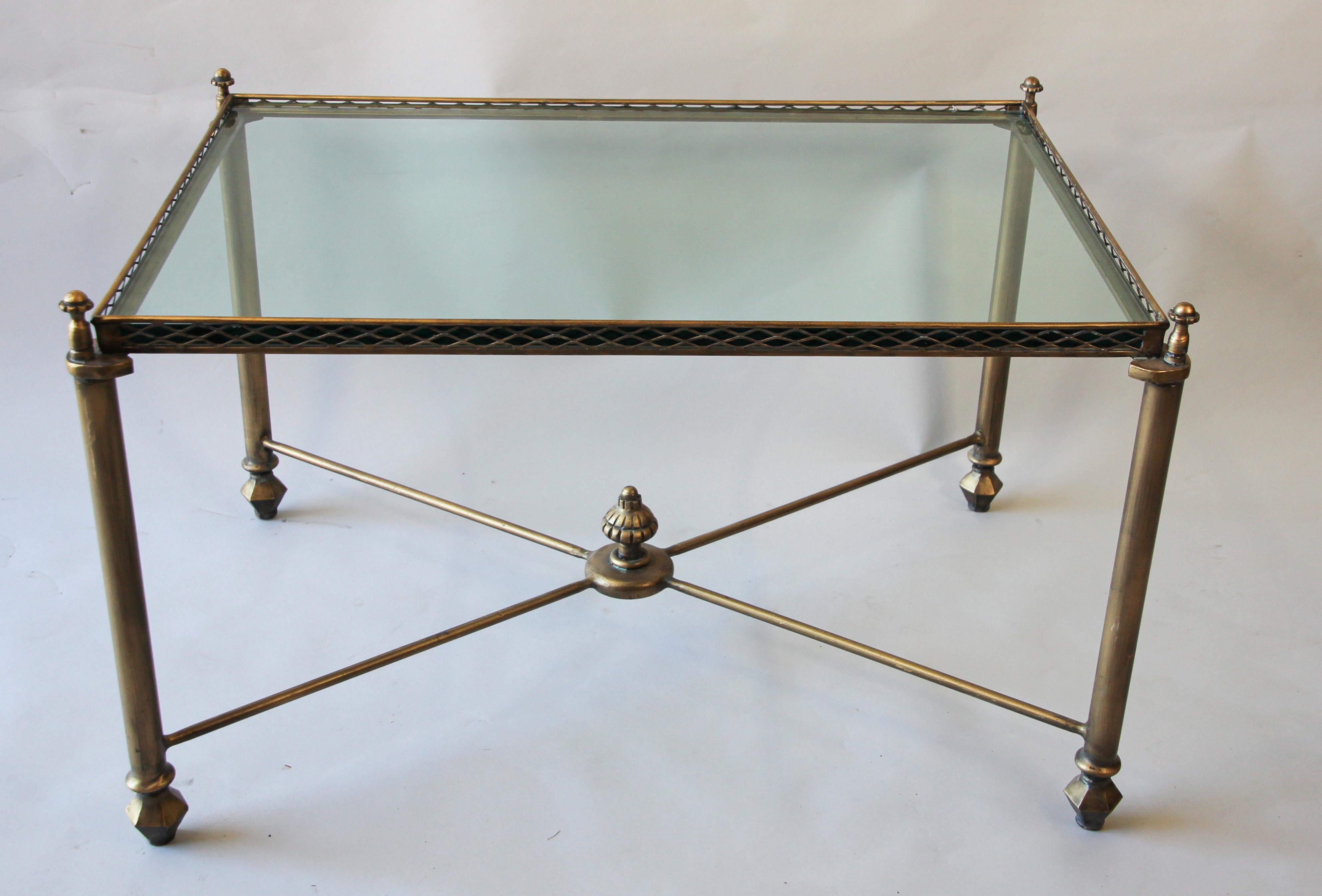 Italian Maison Jansen style brass coffee table with glass top.
Beautiful elegant neoclassical style rectangular brass coffee table.
A good quality circa 1970s heavyweight brass coffee table with very thick glass top.
This Hollywood Regency style