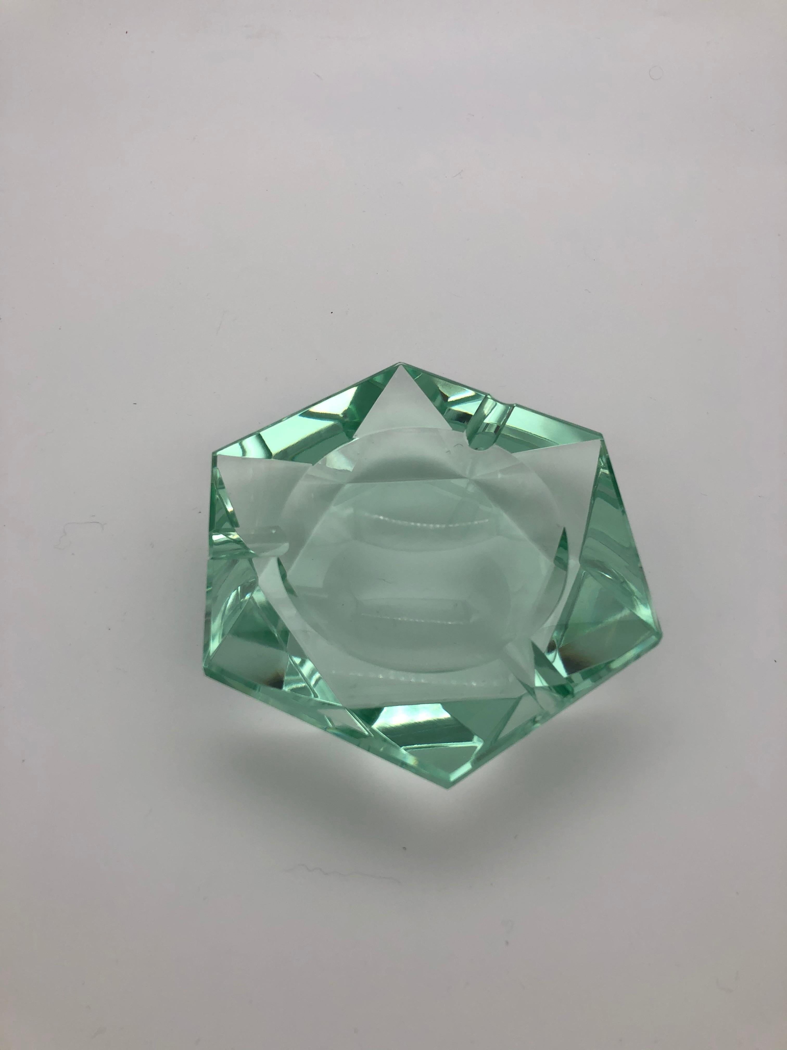 Beveled glass in the shape of a star.