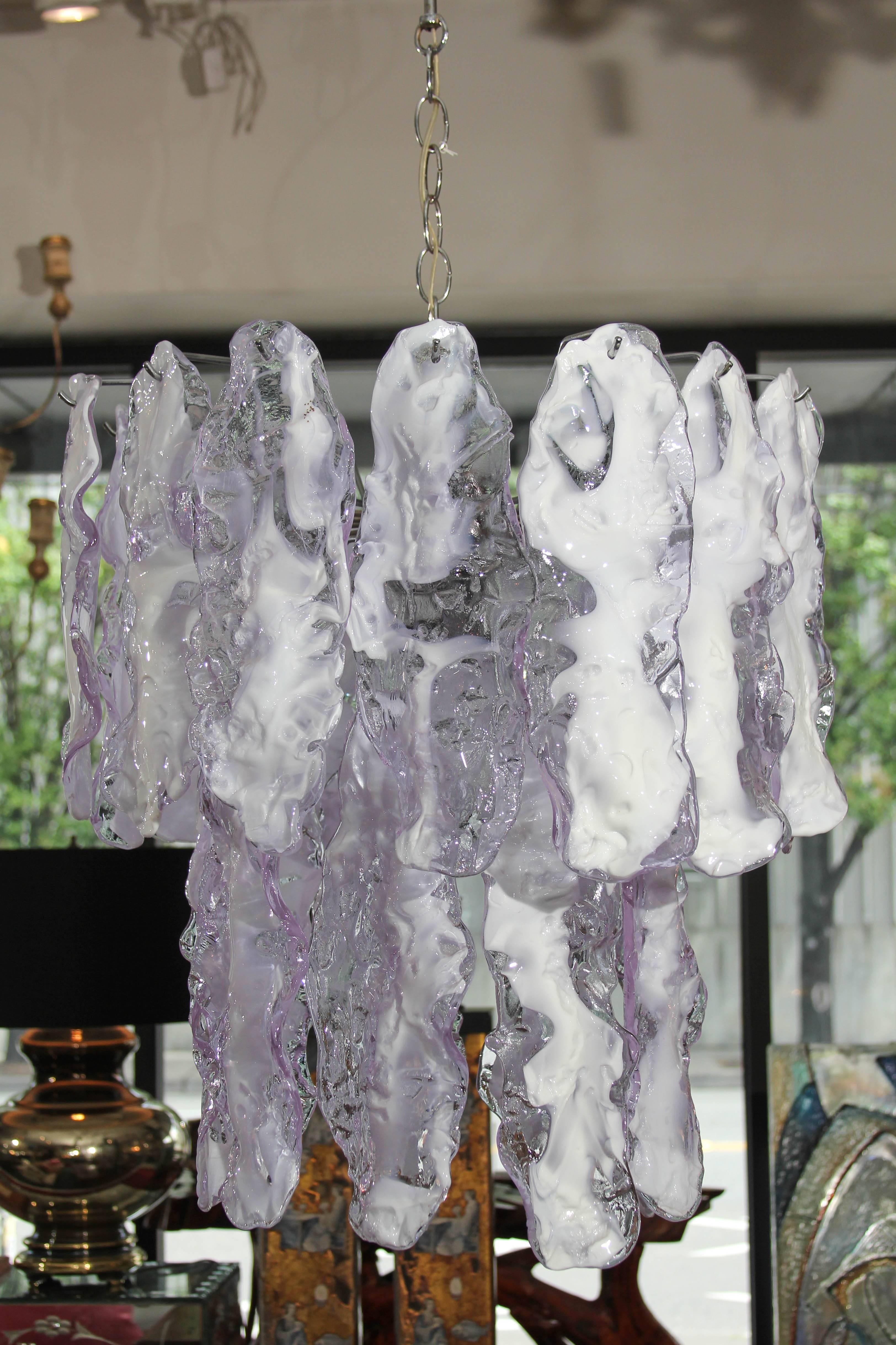 Large irregular lavender and white glass chandelier on chromed frame with six interior lights.