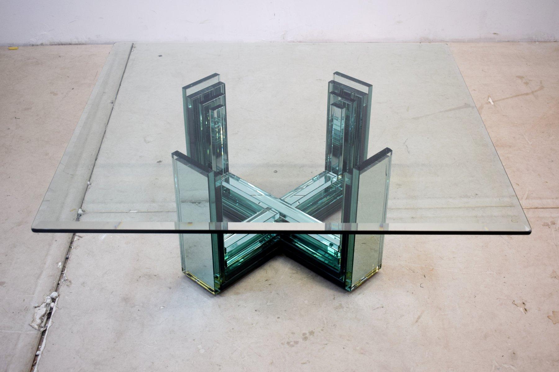 Italian glass coffee table, 1970s.
Dimensions: H= 37 cm; W= 100 cm; D= 93 cm.