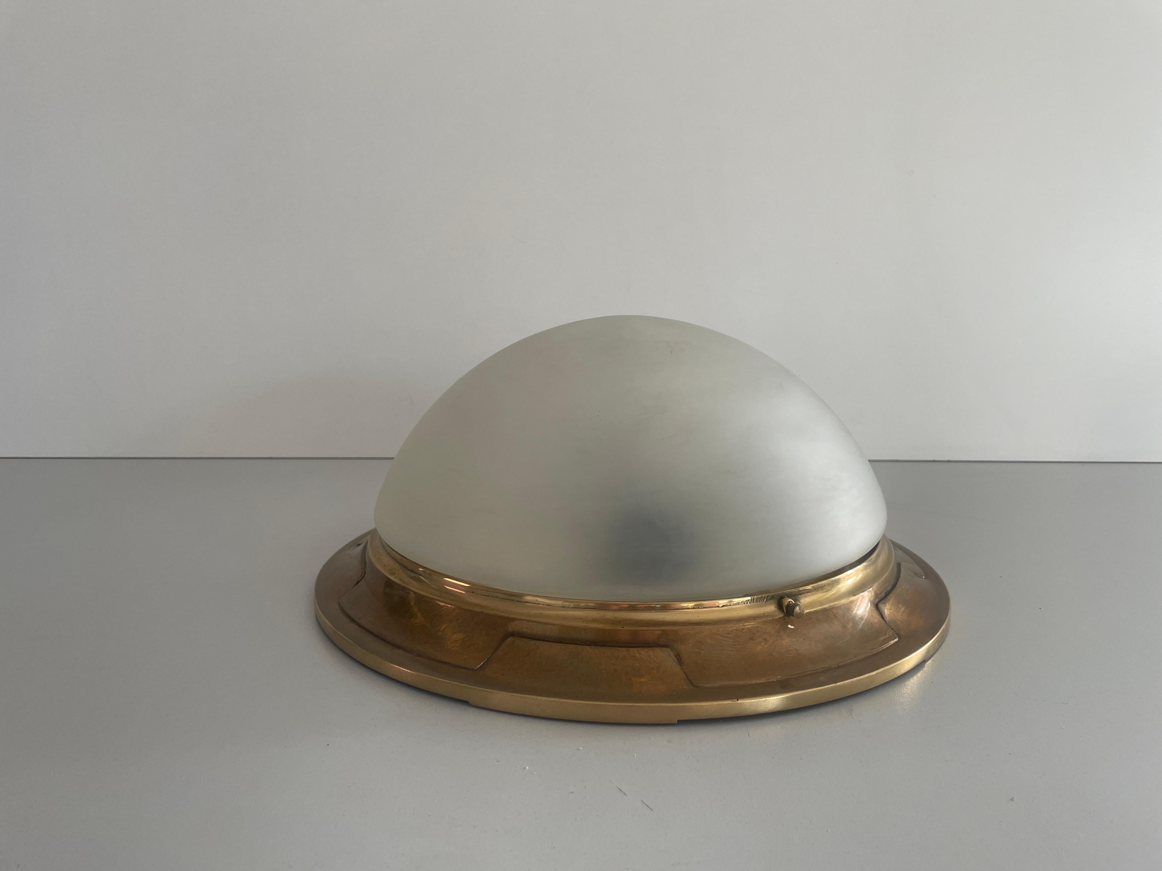 Italian Glass & Heavy Brass Base Ceiling Lamp by Mod Dep Lamp Art, 1960s, Italy

Lampshade is in very good vintage condition.

This lamp works with 2x E27 light bulbs. 
Wired and suitable to use with 220V and 110V for all countries.

Measurements: