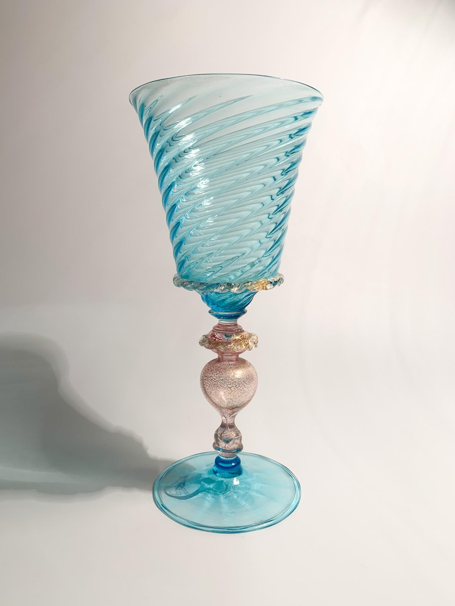Collectable goblet in hand-blown Murano glass, light blue and pink with gold leaf, made in the 1950s

Ø 10 cm h 22 cm