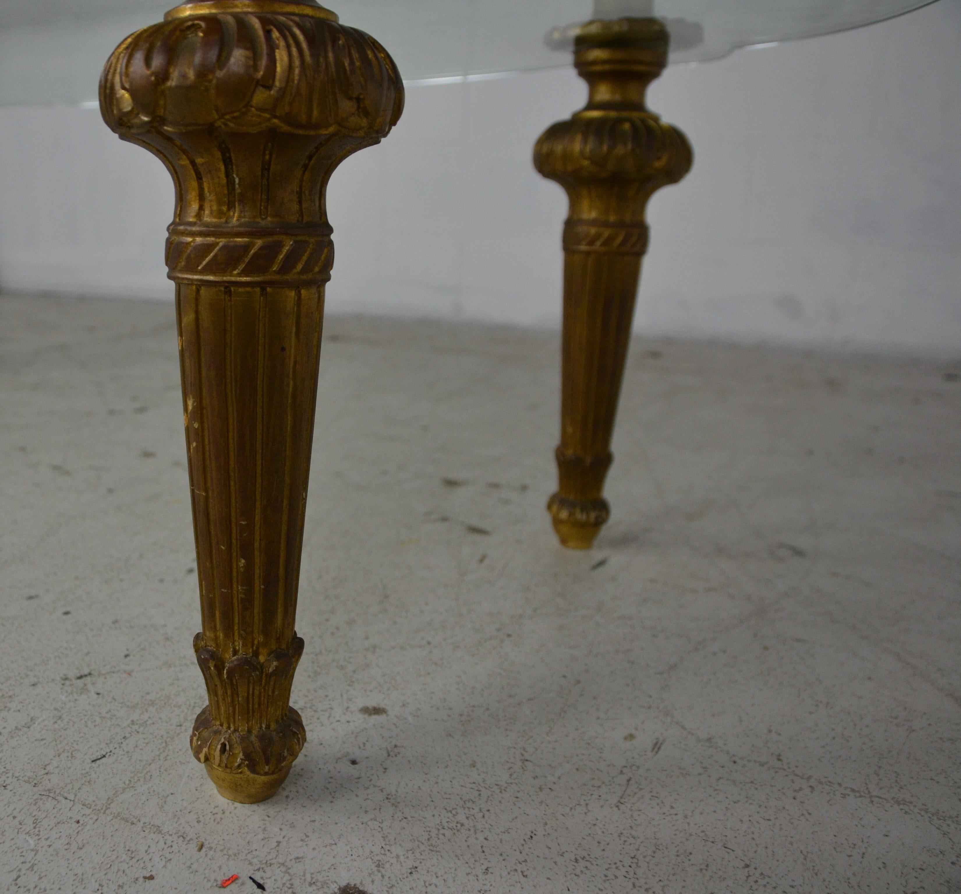 Wood carved reeded legs the top clamps flower medallion. 3.75