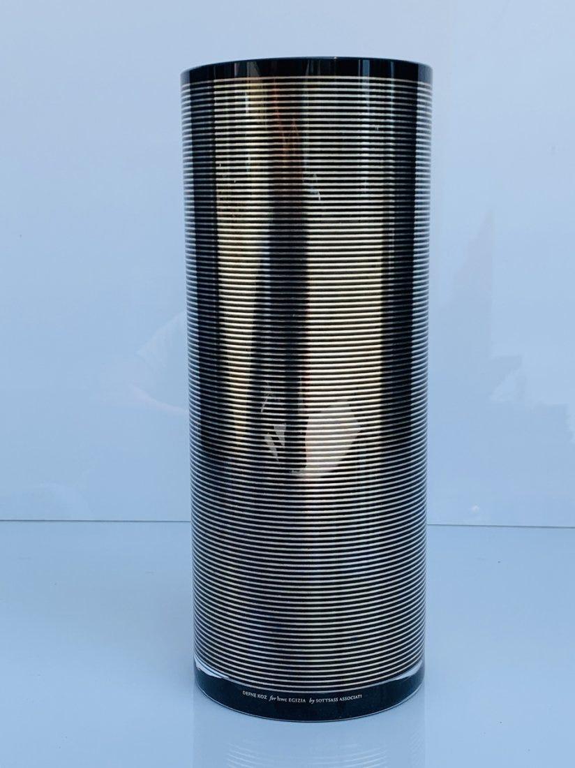 Beautiful glass vase designed by Dafne Koz, manufactured by Sottsass Associati for Egizia.

Made in 1998.

The vase decoration is done in hand silkscreen printing with 980/1000 silver, Baked at 540Â°.

New in the box.

Measures: 
11.75