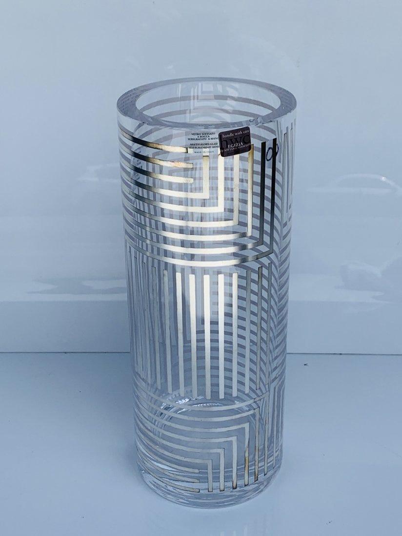 Beautiful glass vase designed by Flavia Alvez de Souza, manufactured by Sottsass Associati for Egizia.

Made in 1998.

The vase decoration is done in hand silkscreen printing with 980/1000 silver, Baked at 540Â°.

New in the box.

Measures:
