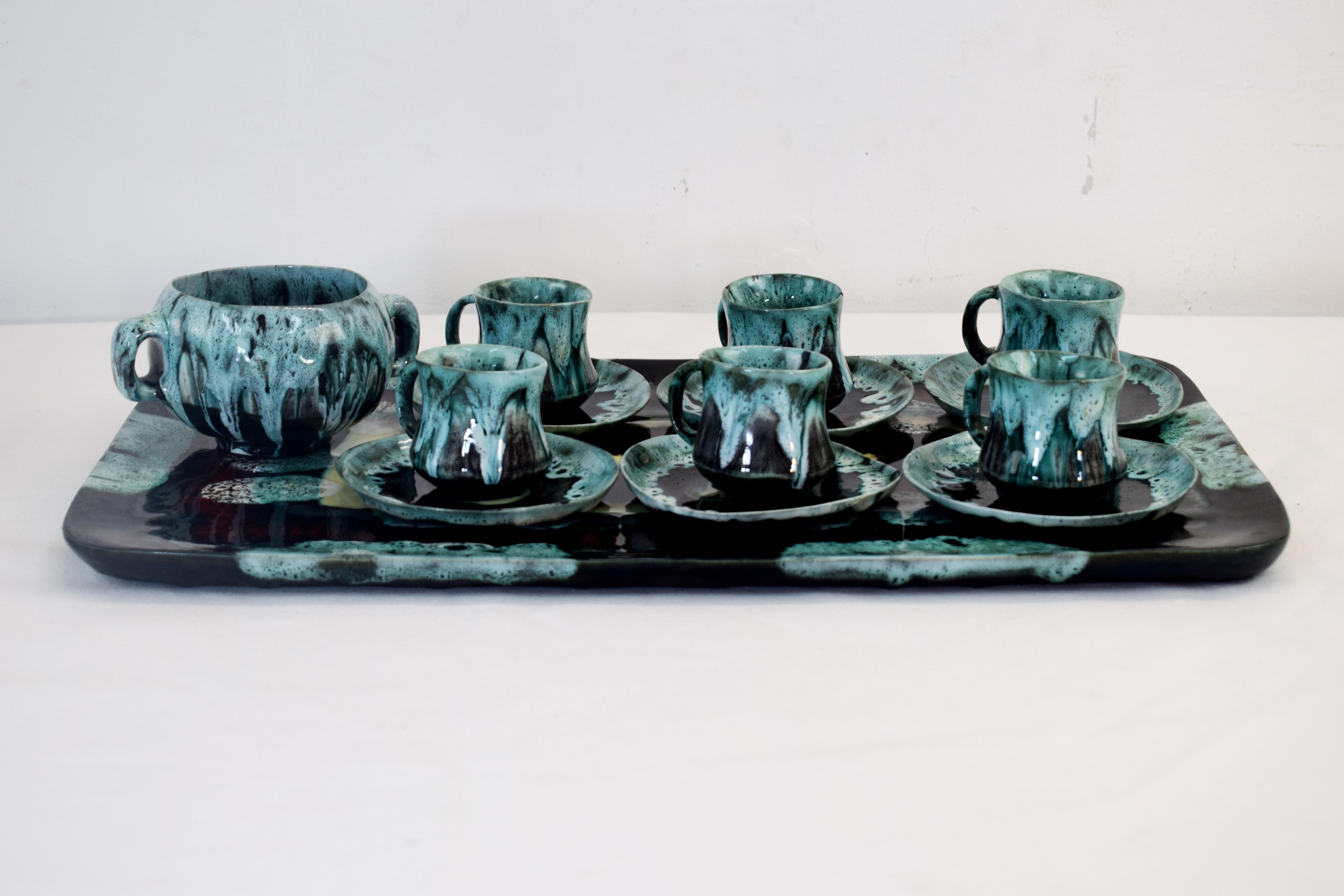 Italian glazed ceramic coffee set from Flora, 1960s.
Dimensions
Tray: H=3 cm; W=47 cm; D=27 cm.
Cup: H=5 cm; D=7 cm.
Saucer: H=2 cm; D=11 cm.
Sugar bowl: H=8 cm; D=11 cm.