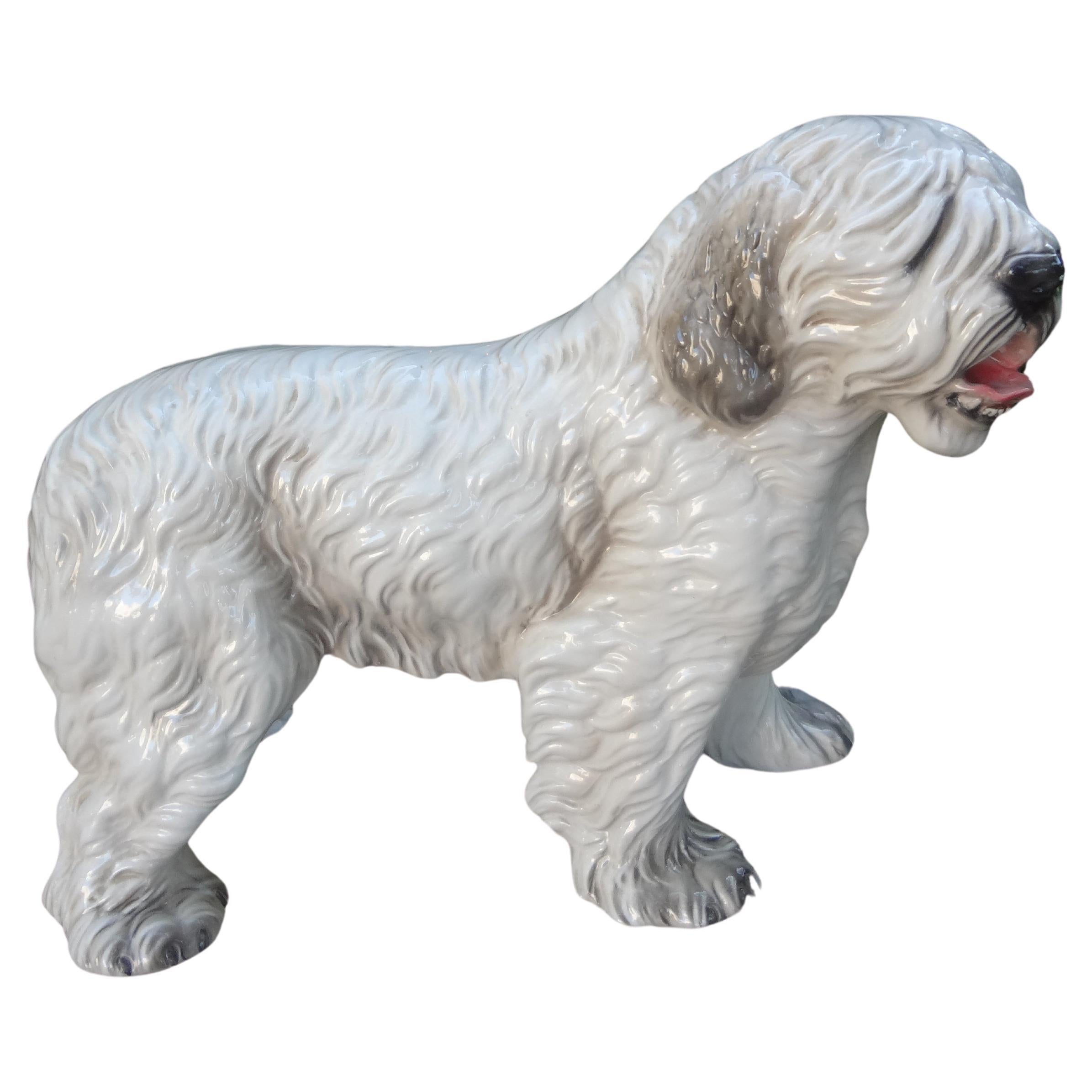 Italian Glazed Ceramic Dog Sculpture.
Well detailed Italian glazed ceramic dog statue or sculpture of a Sheep Dog.
Stamped Ronzan, Made In Italy.