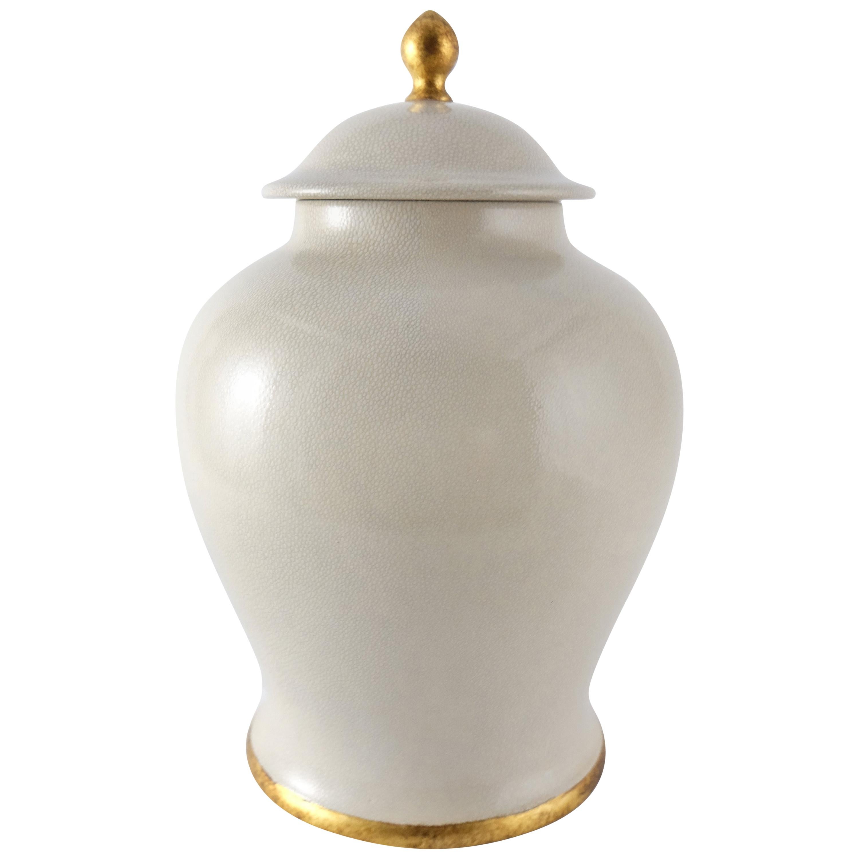 Paolo Marioni Italian Glazed Ceramic Jar with Gold-Leaf Accents

Offered for sale is a glazed ceramic lidded ginger jar by Paolo Marioni. The jar has a subtle crazed-glaze finish and is accented in gold-leaf. The jar is signed on the base.


 
