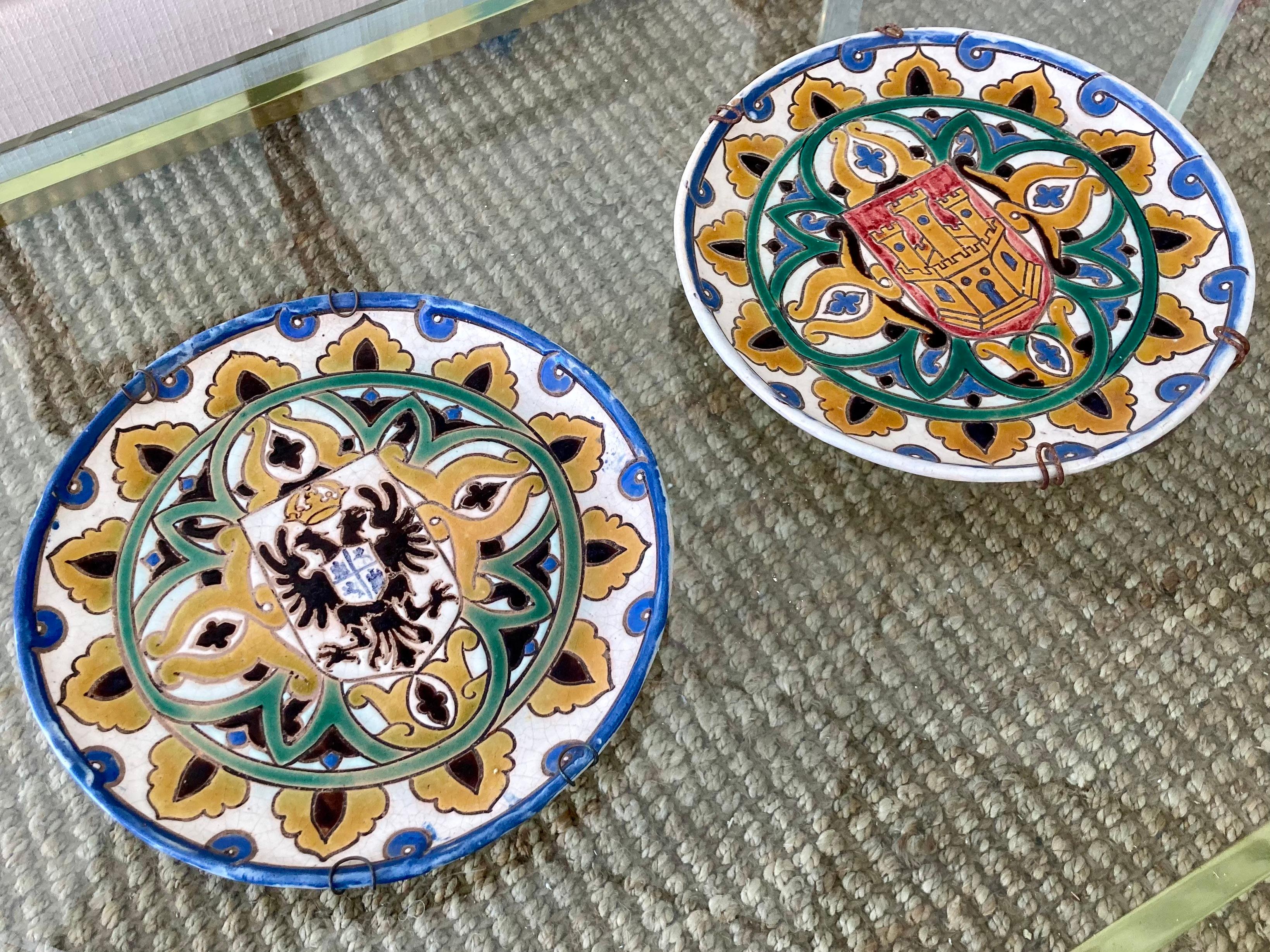 Beautiful pair of Italian glazed terra cotta castle wall plates. Great vibrant colors. Easy to hang with original wall hangers on back. From a Palm Beach Mizner Estate.