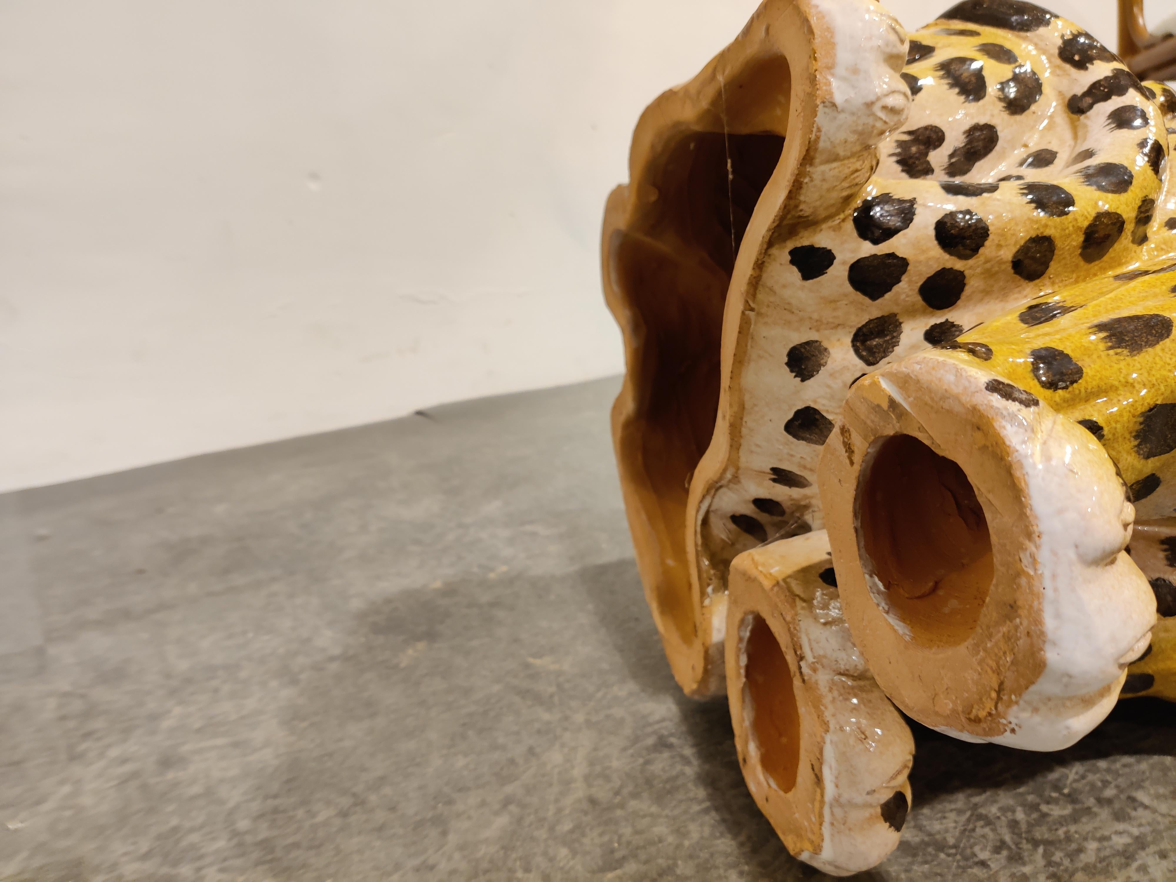 Hand painted glazed terracotta leopard sculpture with open mouth.

Heavy sculpture, all hand painted.

Good condition, no damage

1960's - Italy

Dimensions: 
Height: 82cm/32.28