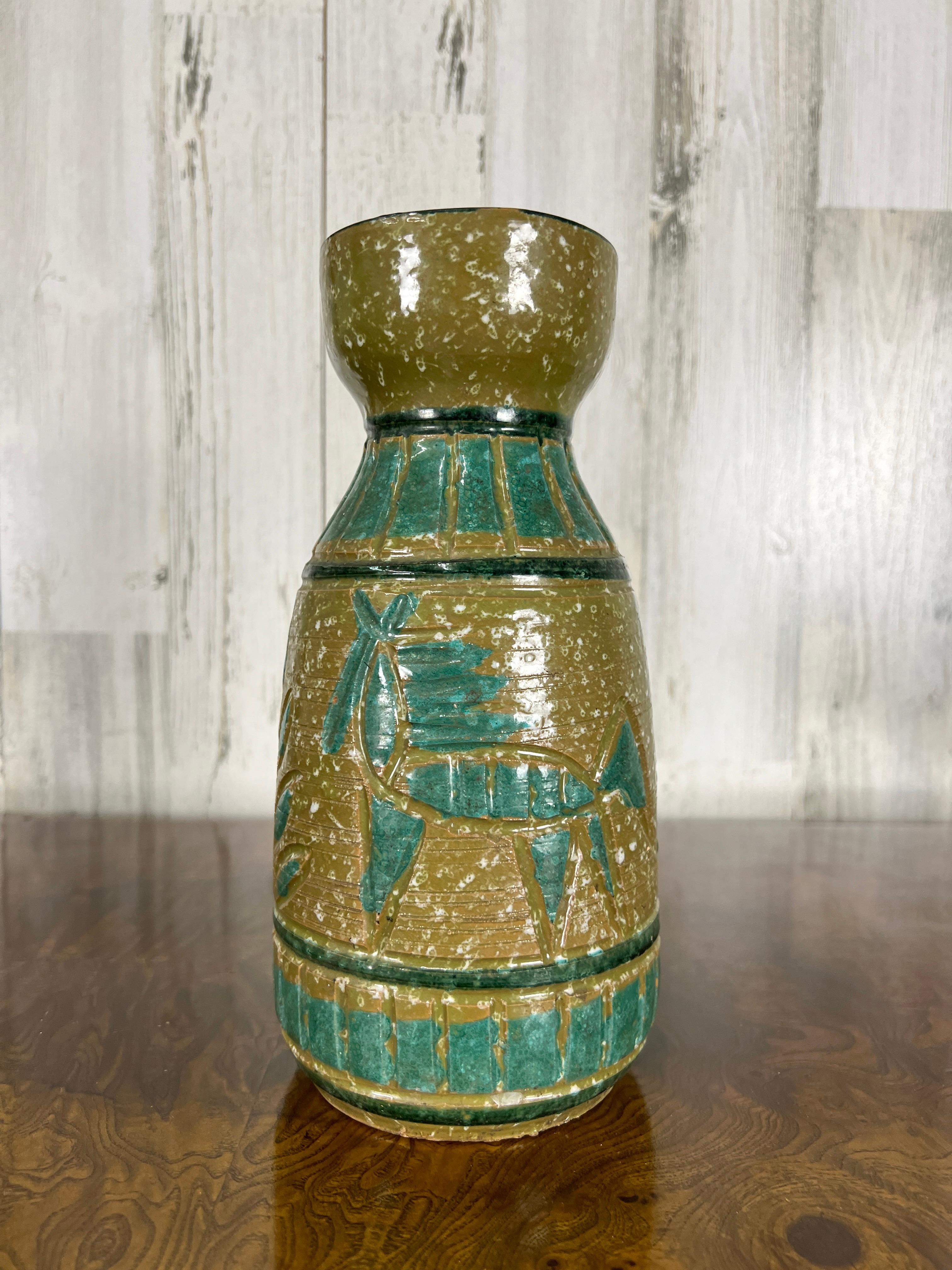 Avocado and spruce colored glaze surround this vase with horse and tree design. 
Made in Italy.