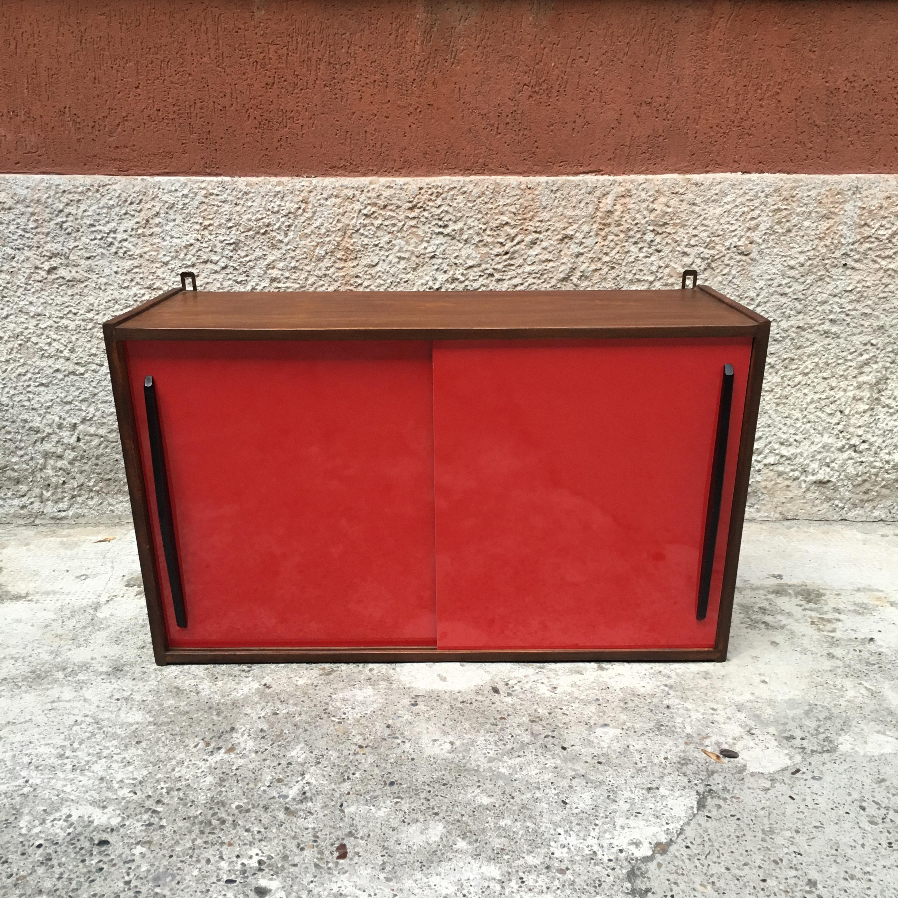 Italian red formica and black wood kitchen wall unit, 1960s
Sliding doors wall unit with glossy red formica surface and black painted wood handles.
Colored in compliance with the original finishes and fully restored.