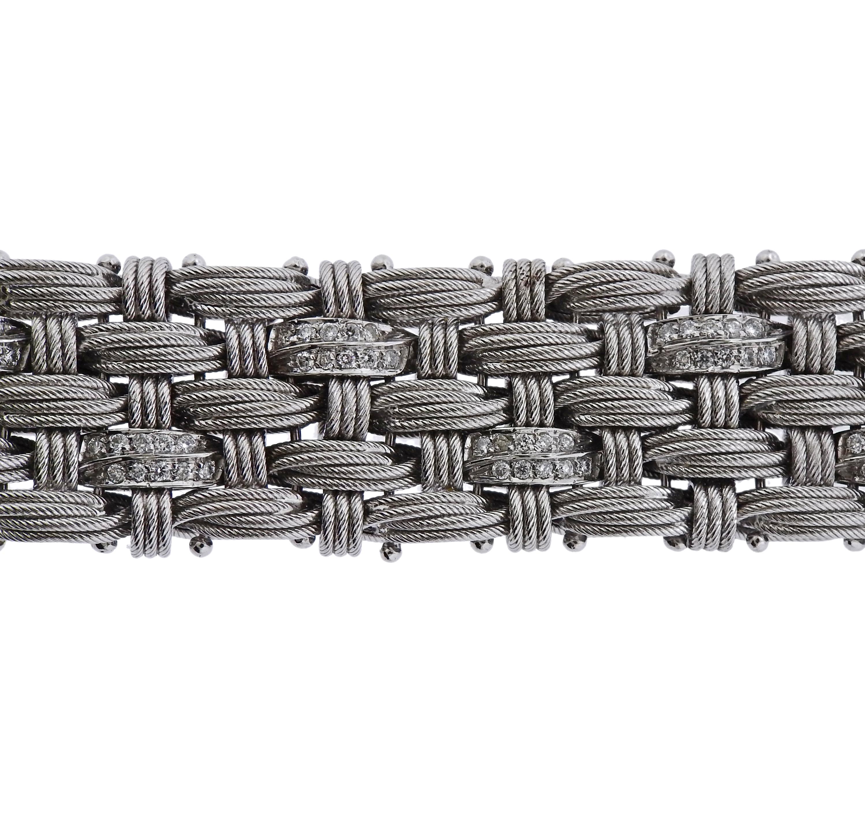14k white gold Italian made woven motif bracelet, decorated with approximately 1.40ctw in H/VS diamonds.  Bracelet is 7.5