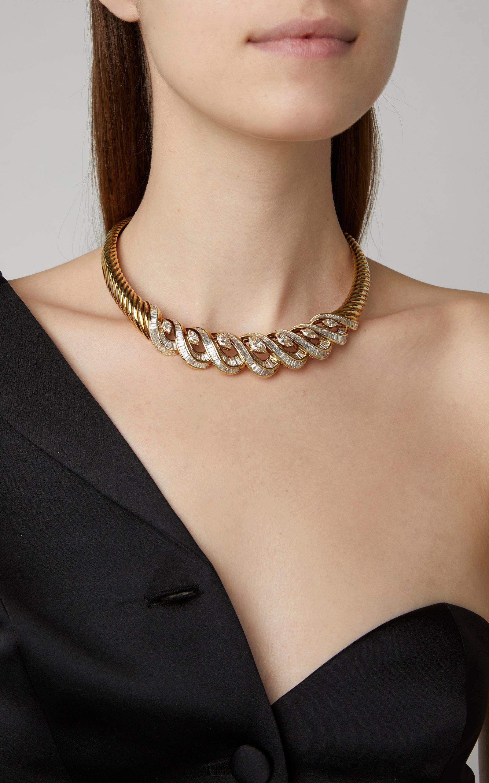 A refined necklace of undulated design in 18kt yellow gold with marquise and baguette cut diamonds (27 cts total). Made in Italy, circa 1960s.