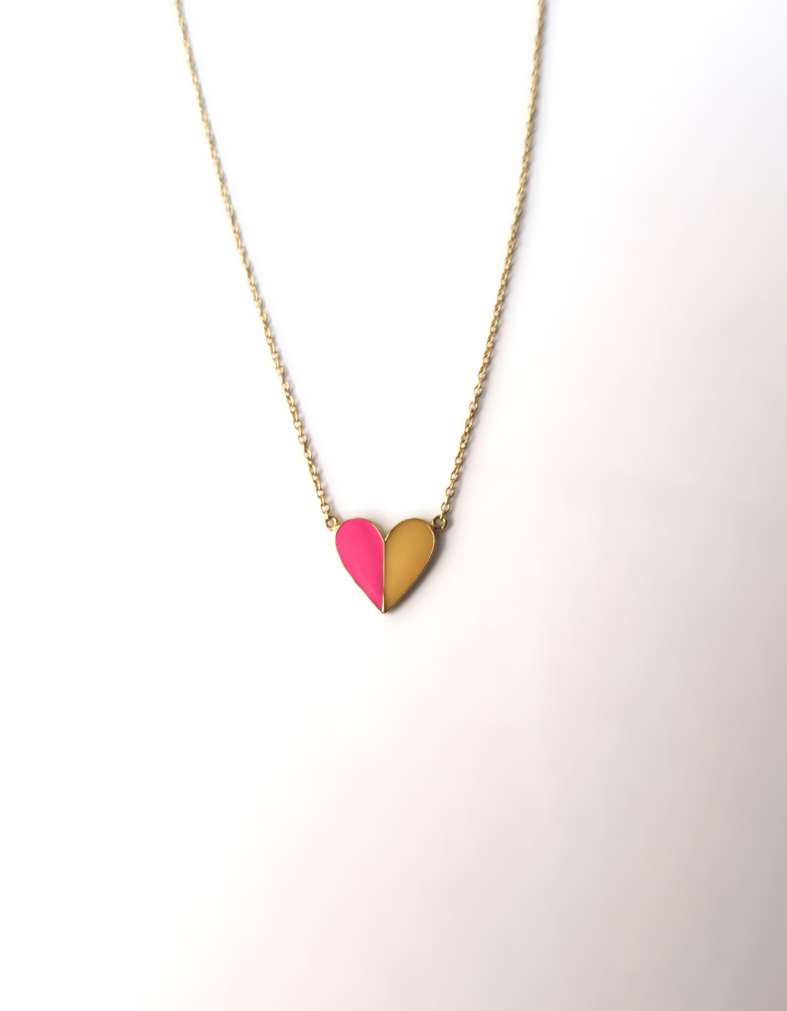 A beautiful Italian 14-karat gold and enamel (bright pink and yellow) heart necklace. Colors are reminiscent of the Italian summer spirit beach coast. Beautiful as a standalone necklace or stack with other necklaces. Necklace has two-length options