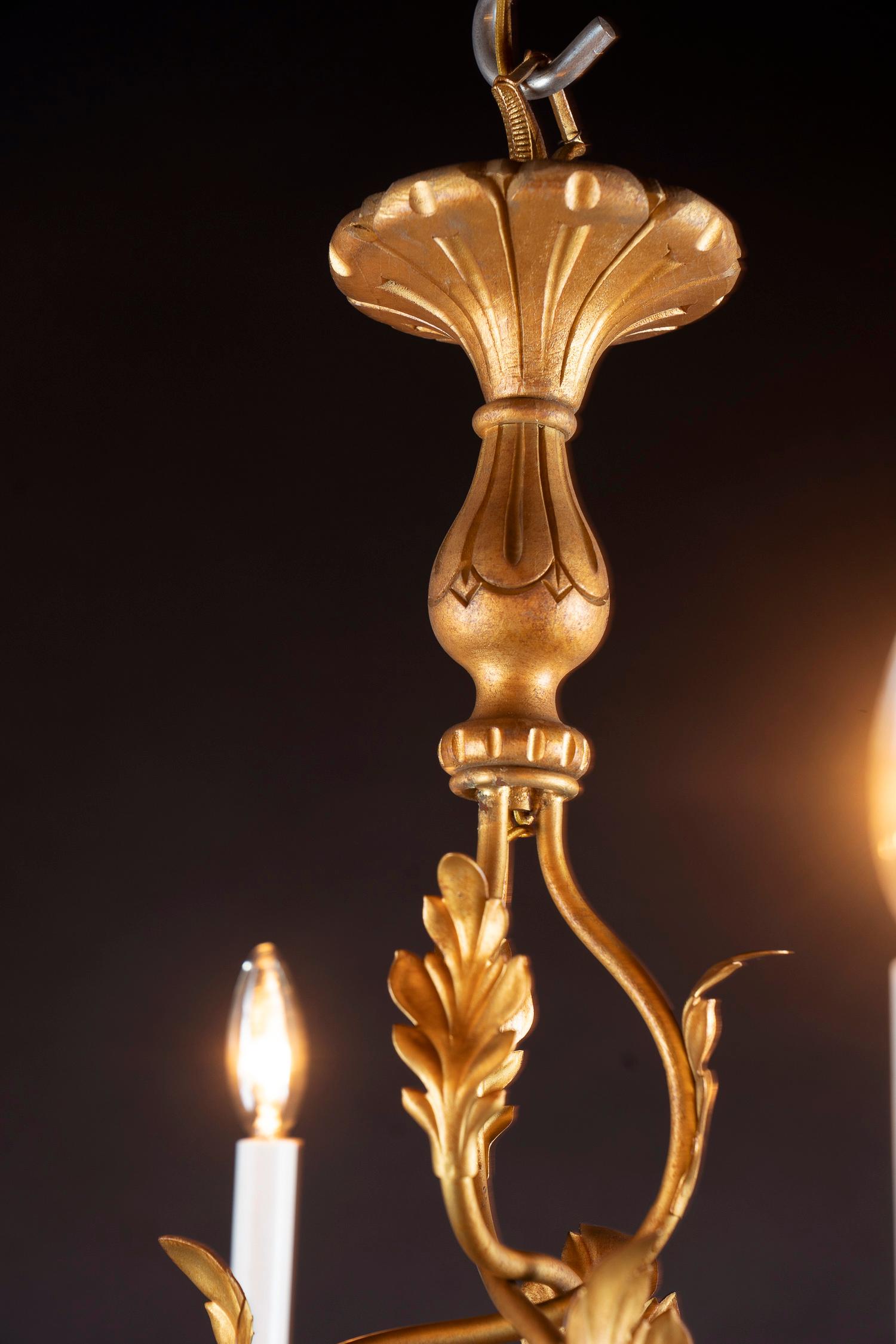 wood and brass chandelier