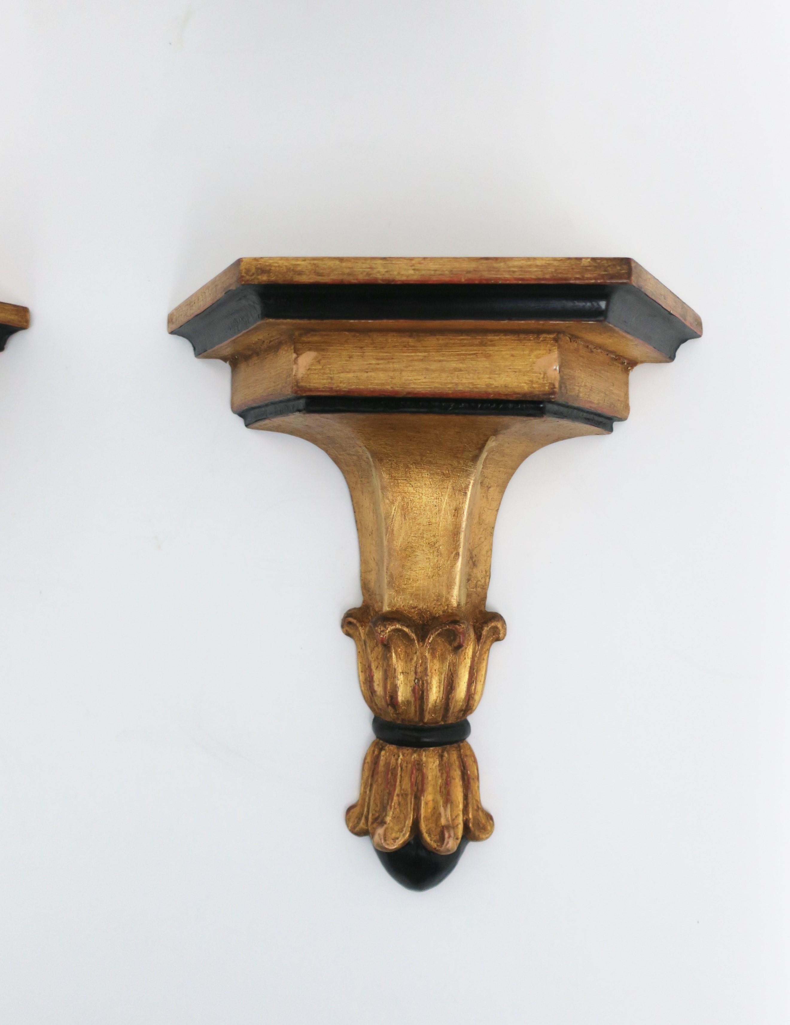 Gold Leaf Italian Gold Giltwood and Black Wall Shelves Brackets, Pair