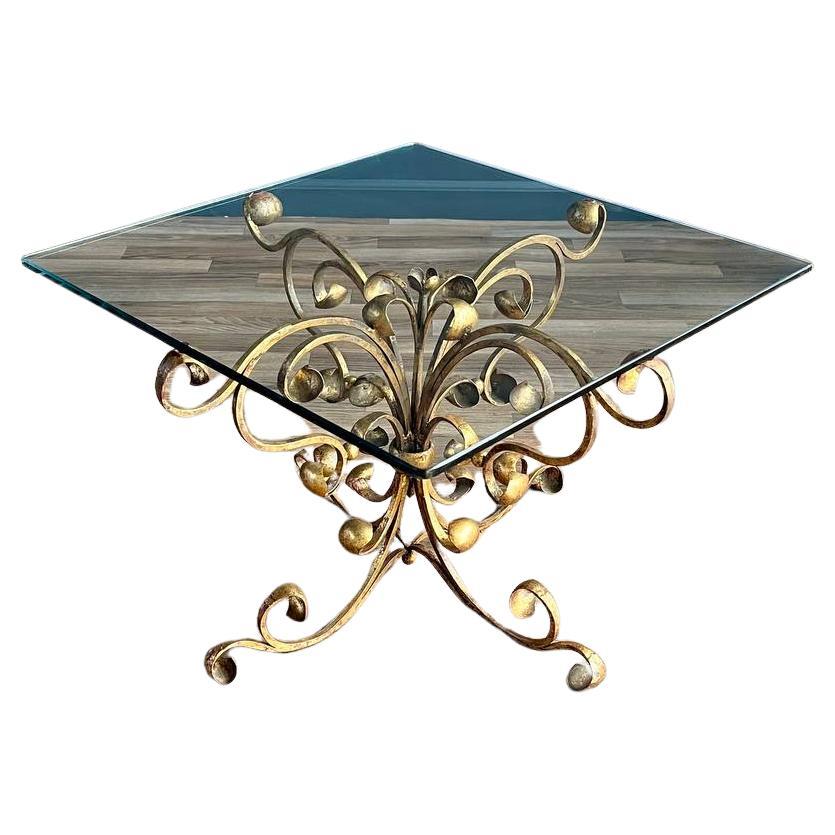 Table italienne en fer feuilleté d'or avec plateau en verre