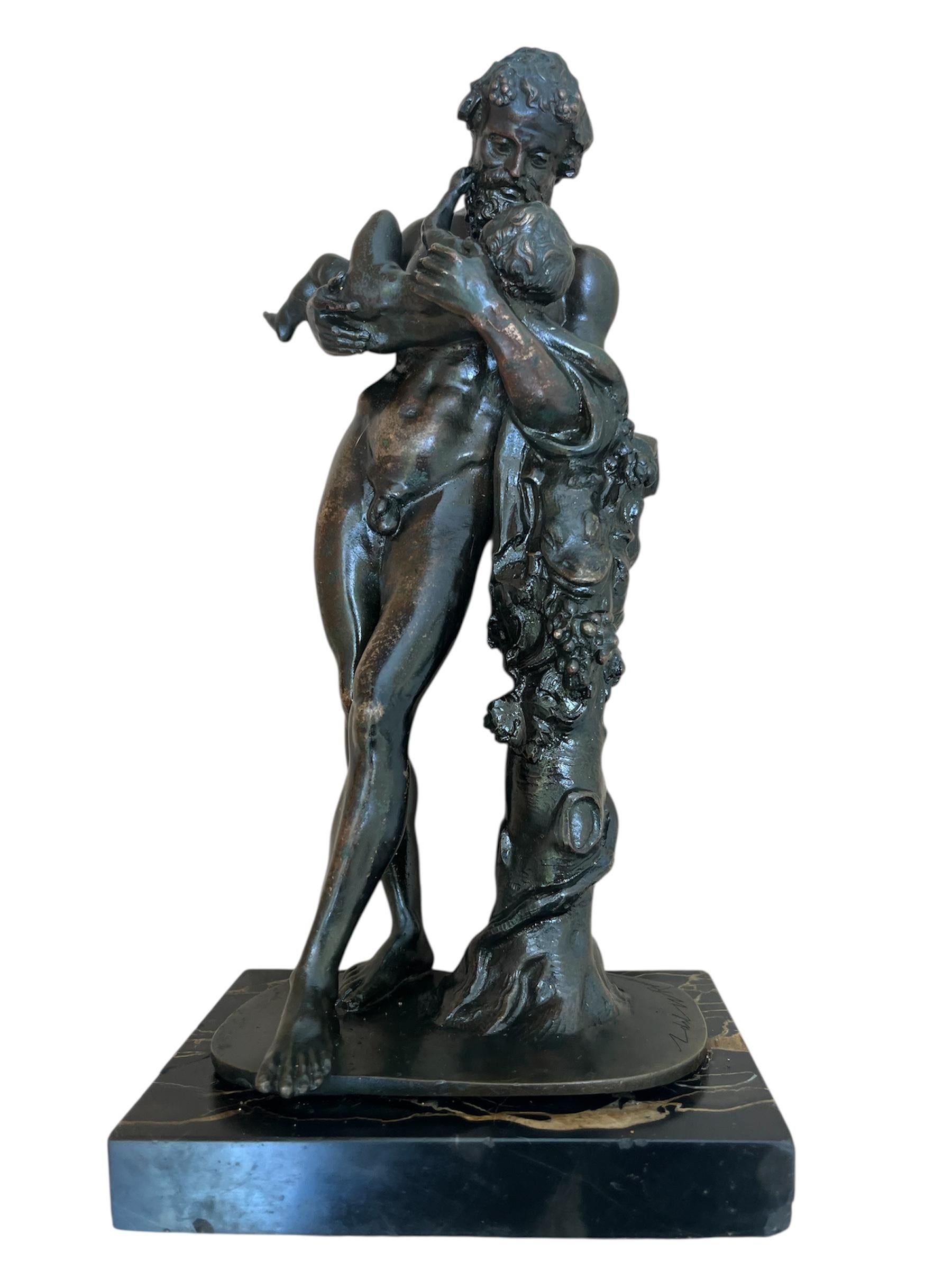 Italian Grand Tour 19th Century Bronze Statue of Silenus Cradling the Infant Dionysus

Very fine bronze statue of Silenus and the infant Dionysus. This well cast figure of Silenus is After the Antique. It is believed to be a Roman copy of a statue