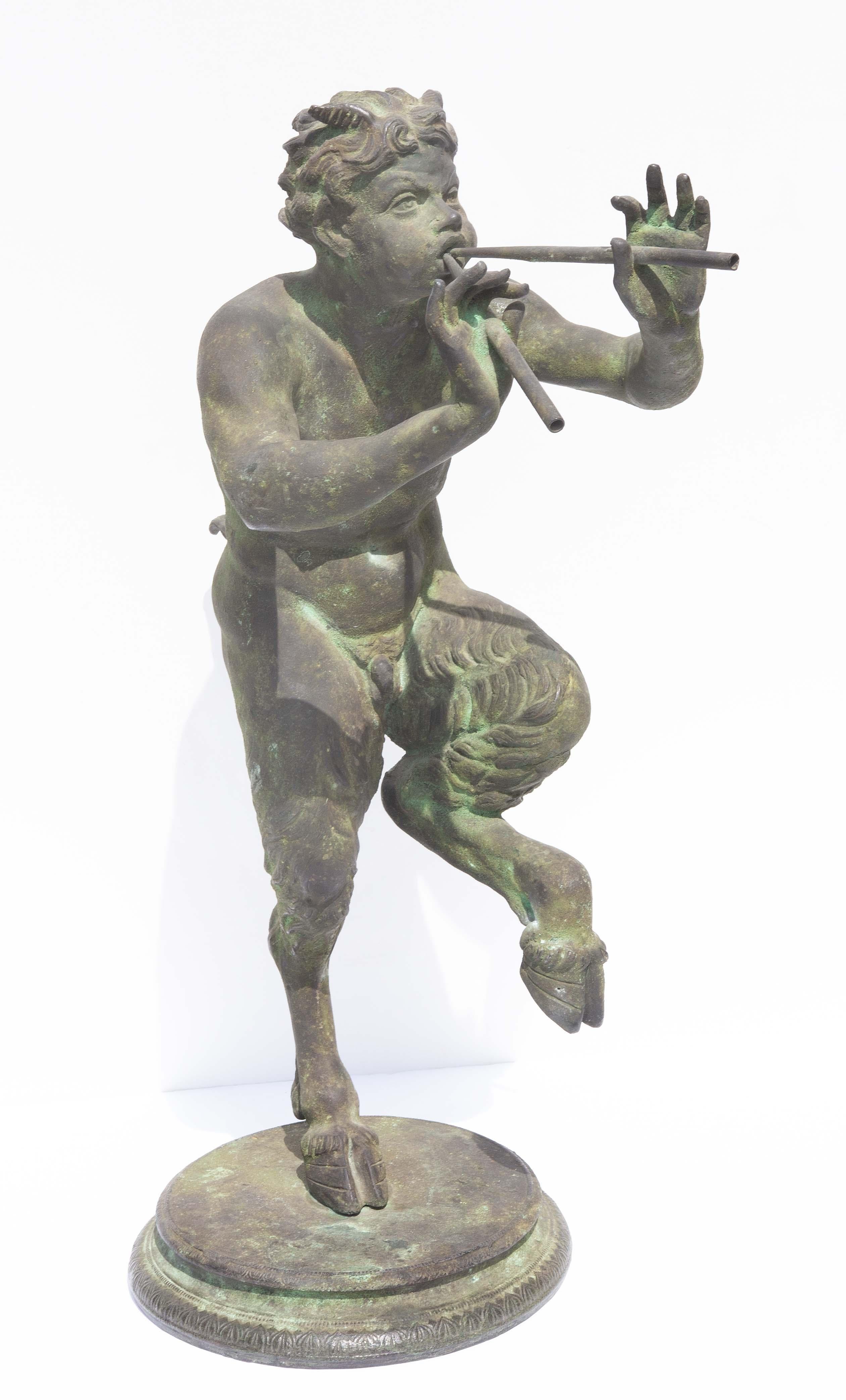 Grand tour bronze of Pan. Italian. Verdigris patina. In Classical Mythology, Pan is the original bad boy. He watches over flocks, forests, mountains, and all wild things. He shares this aspect with Apollo. But, also, with Apollo, he shares a taste