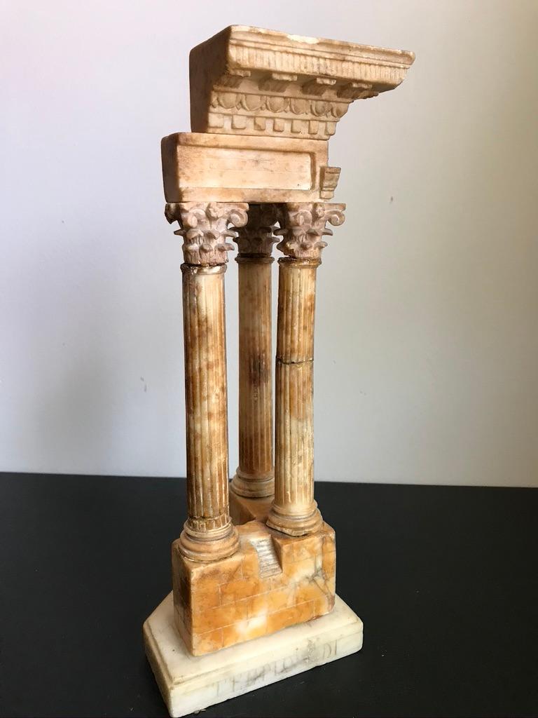 Carved from Siena and white marble, this is a handsome example of a souvenir carving which would have been collected by a European or American sophisticate making a Grand Tour of the ancient sites of Rome and the rest of Italy. This wonderful