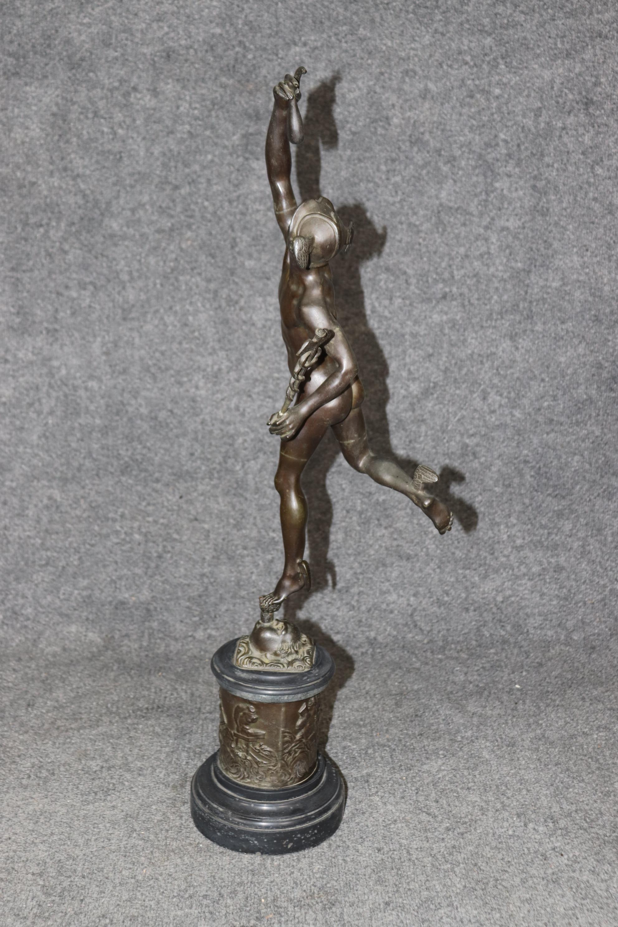Dimensions - H: 31 3/4in W: 8in D: 10in

This Italian Grand Tour Style Bronze of Mercury After Deande Bologne is truly a lovely piece of home decor. If you look at the photos provided you will see the bronze of mercury in a striding position which