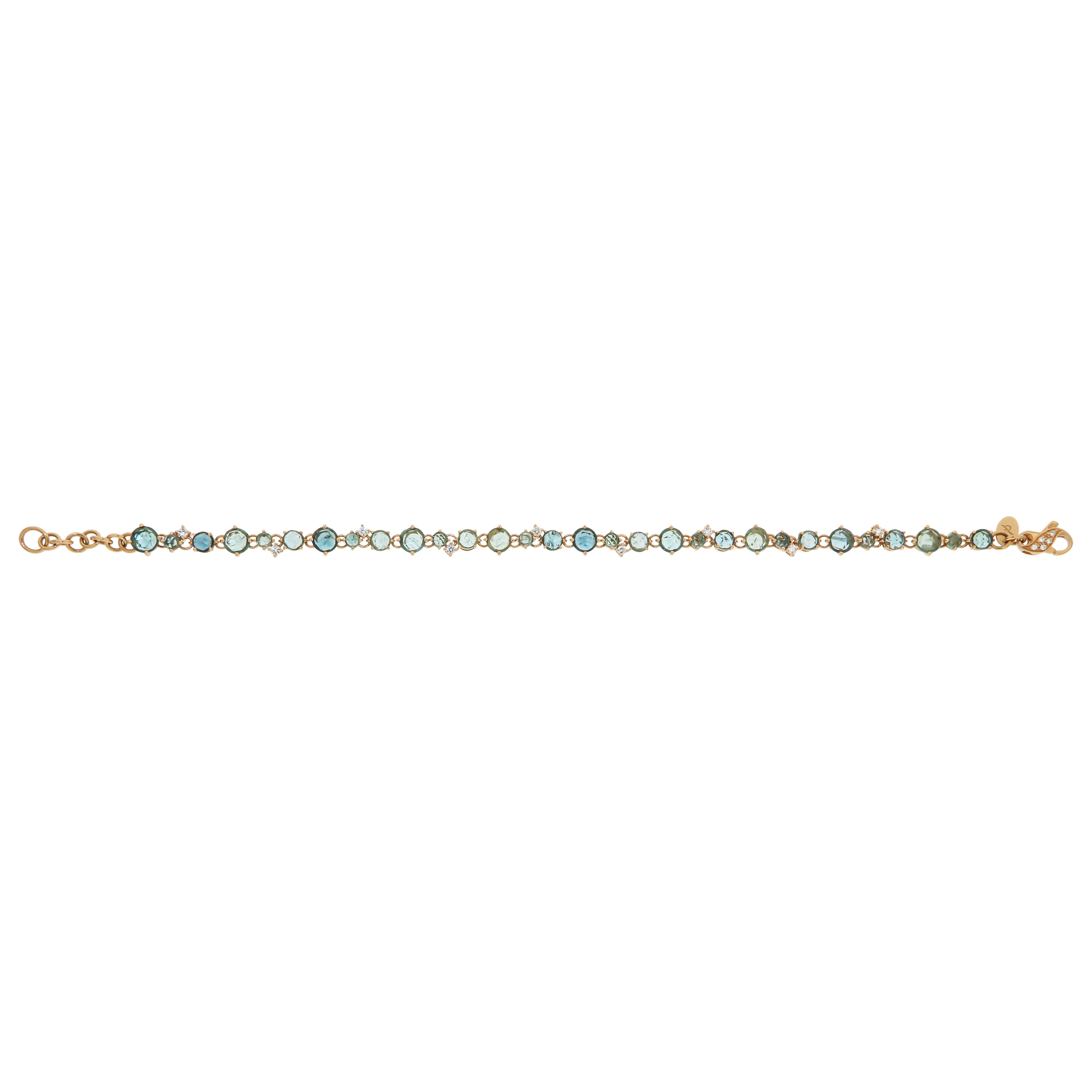 Bracelet Rose 18K Gold 

Diamond 0,99 ct
Green & Blue Tourmaline

Length 20 cm 
Weight 9,7

It is our honour to create fine jewelry, and it’s for that reason that we choose to only work with high-quality, enduring materials that can almost
