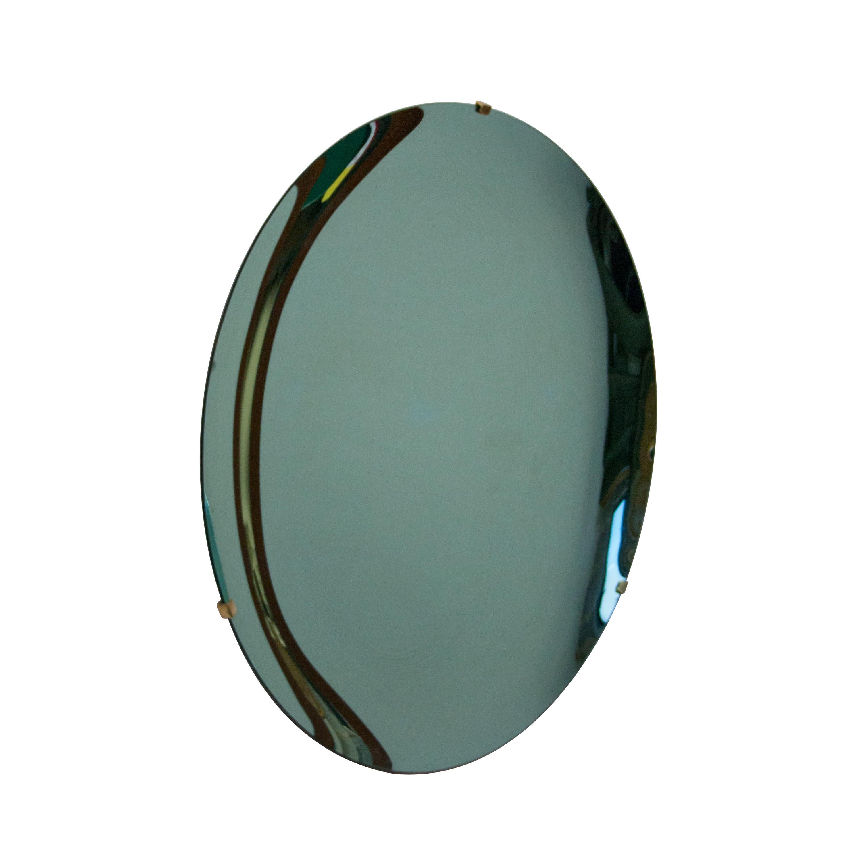 Hand-crafted green murano glass concave mirror. With brass back structure for hanging on the wall.