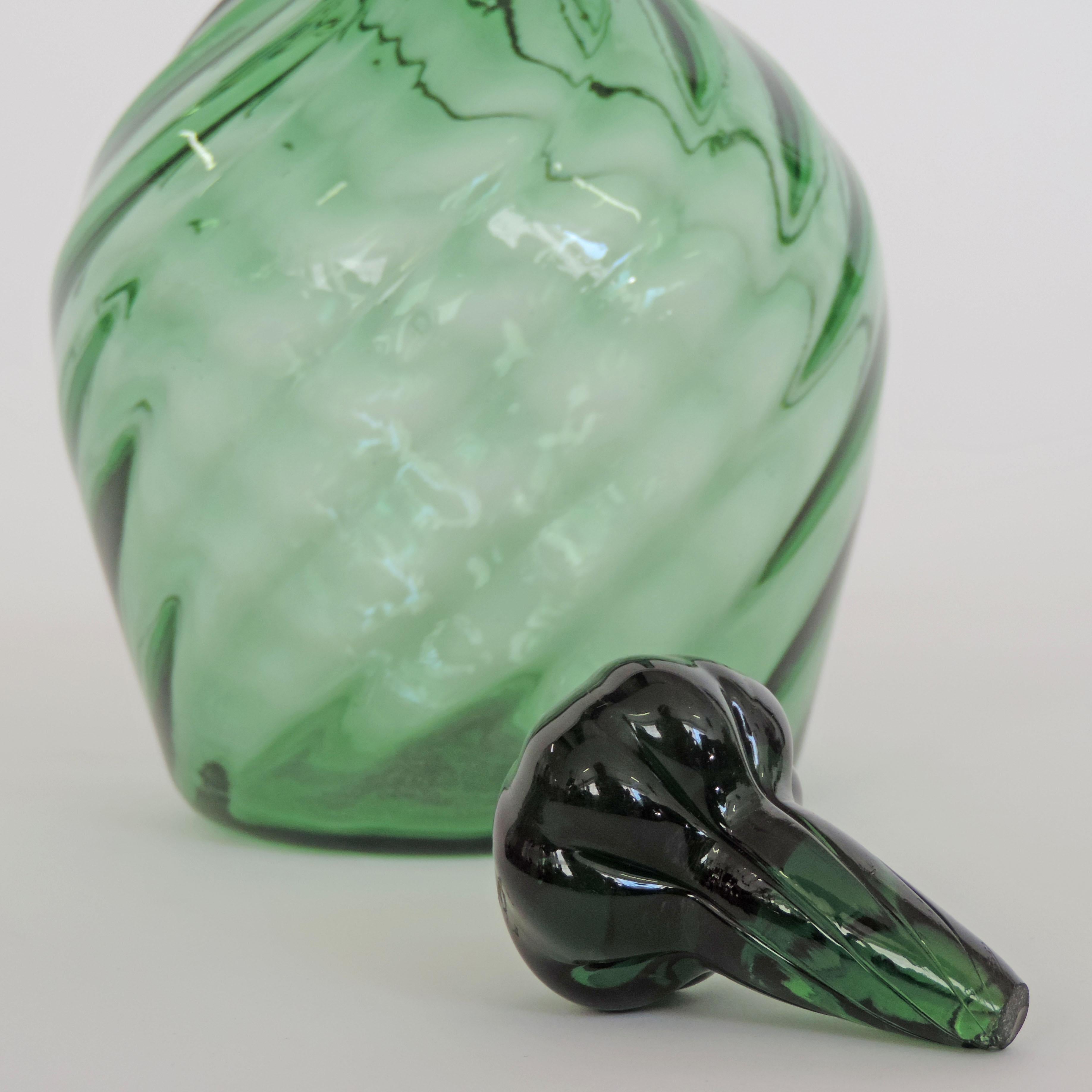 green glass decanter with stopper