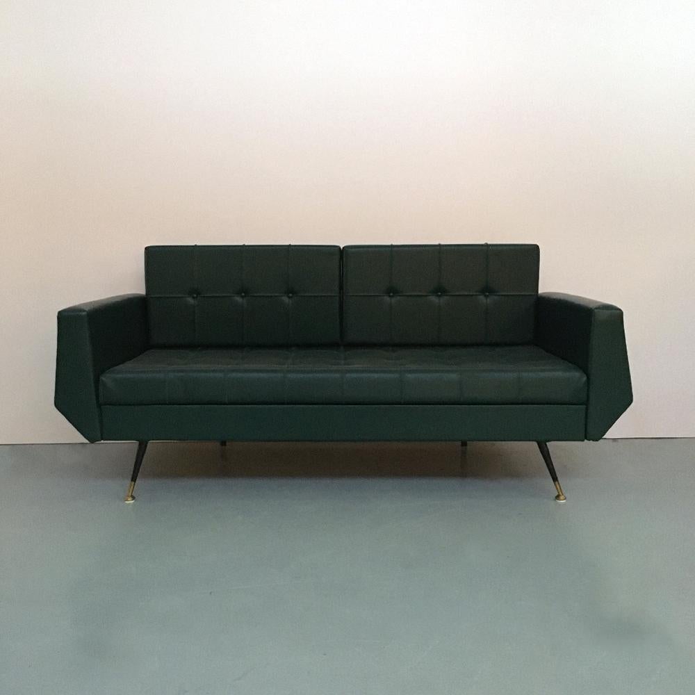 Italian green faux leather and metal set of sofa bed and two armchairs, 1950s
Sofa bed and armchairs with upholstery in stitched green faux leather, metal structure and brass tips
Perfectly preserved
Sofa measures 160 x 80 x 75 H cm
Armchair