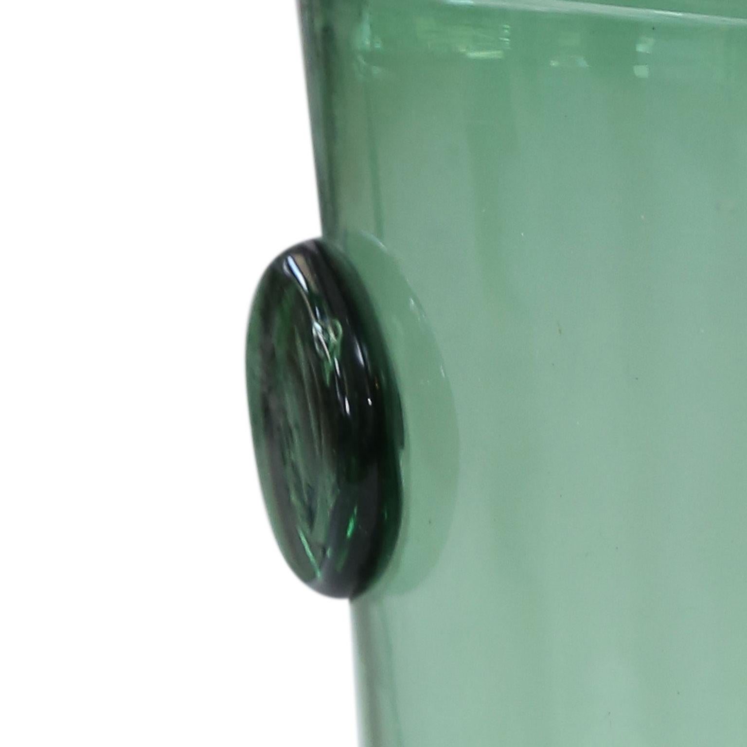 Italian green glass vase decorated with glass medallions. Hand blown by Empoli, circa 1960.