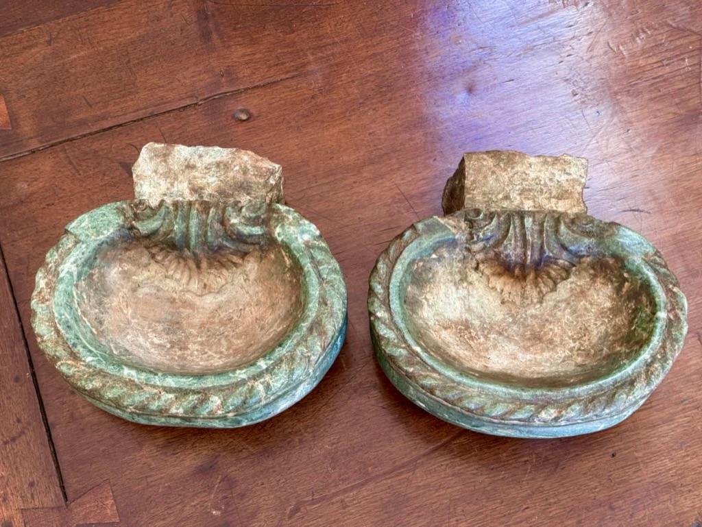 A pair of lovely Italian green  marble, 18th Century, likely from Venice.  Having carved, braid detail to the rim and foliate carving into the bowl.  3.25” h. x 9” w. x 8.75” d

