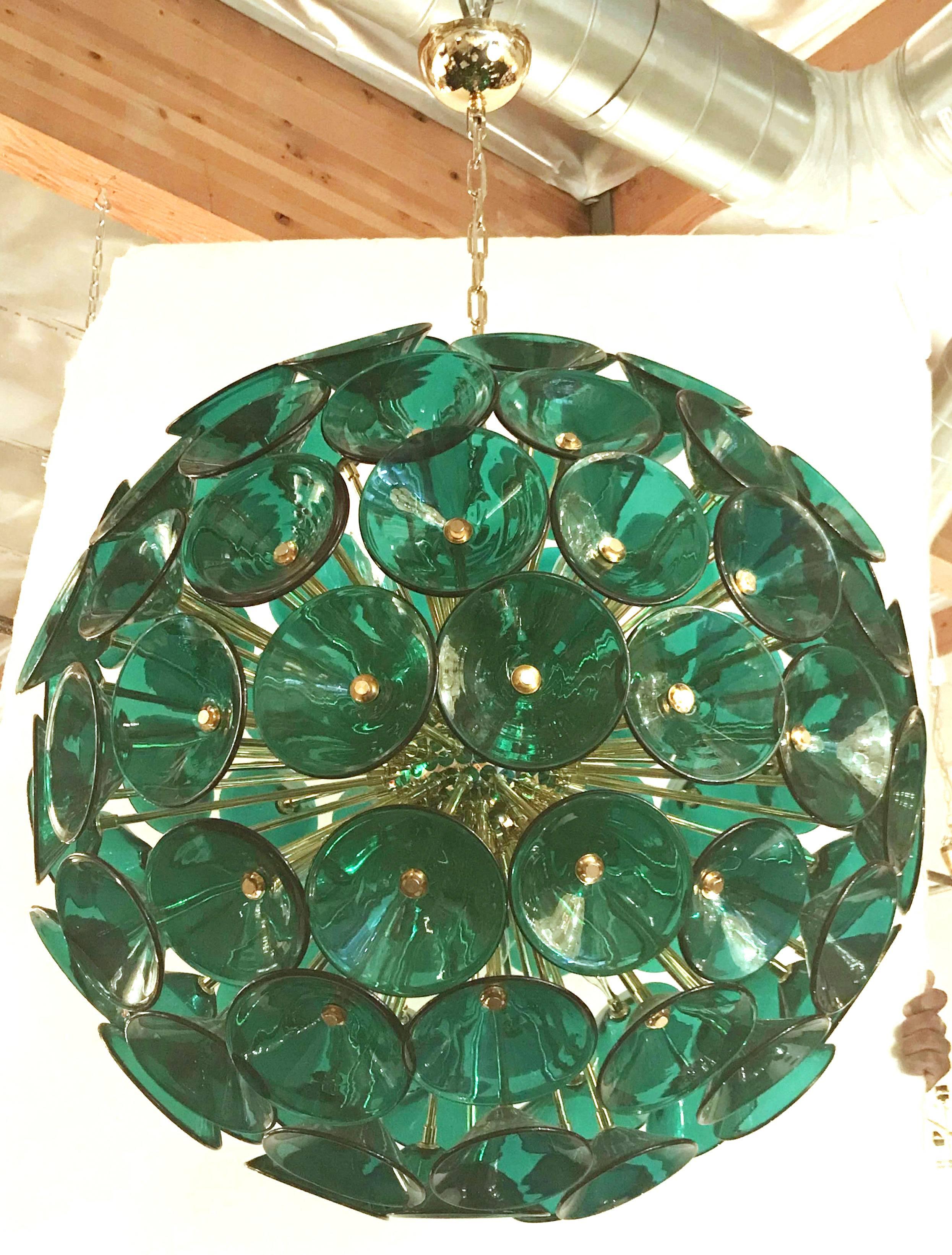Sputnik chandelier with 105 vintage green Murano glass trumpets by Vistosi on new metal frame by Fabio Ltd. available in chrome or 24k gold metal finish.
12 lights / E12 type / max 40W each
Diameter: 29 inches / Height 29 inches
1 in stock in Palm