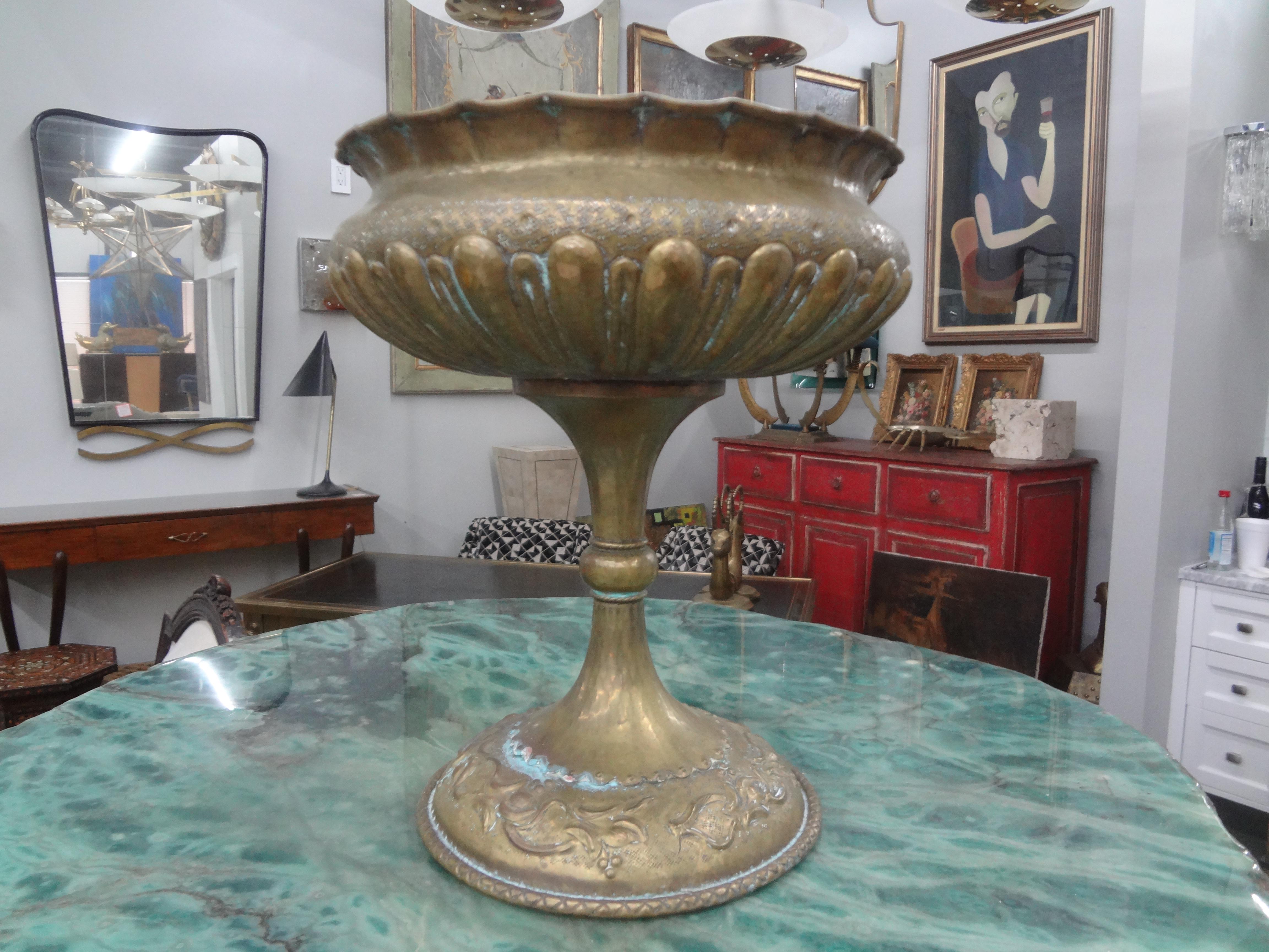 Italian Hammered Brass Urn Or Vessel.
Stunning Italian Art Deco hammered brass urn or vessel.
We have two other similar urns offered on 1stdibs.
To see all our offerings on 1stdibs, we are 
Kirby Antiques
Houston, Texas