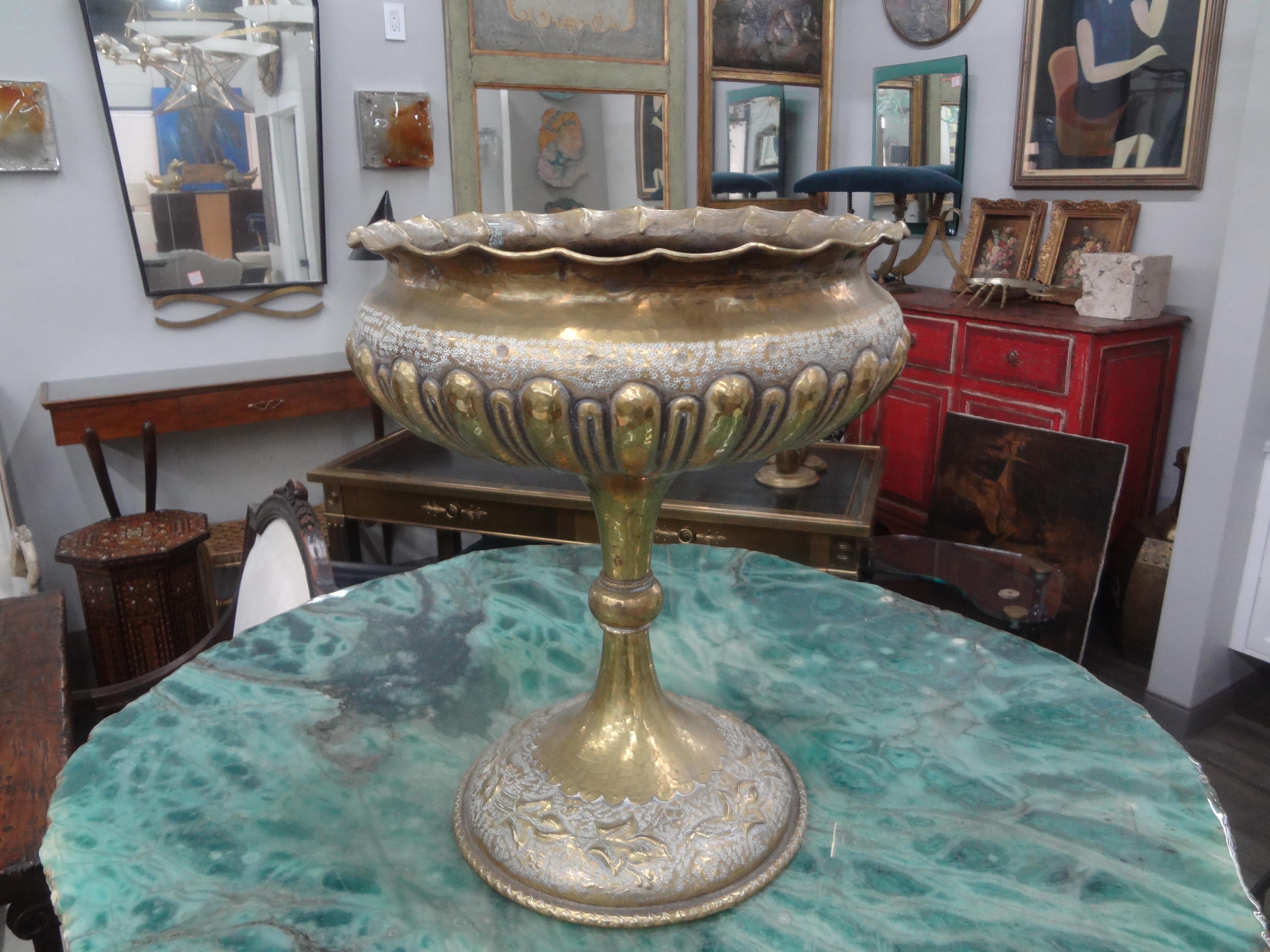 Italian Hammered Brass Urn Or Vessel.
Stunning Italian Art Deco hammered brass urn or vessel.
We have two other similar urns offered on 1stdibs.
To see all our offerings on 1stdibs, we are 
Kirby Antiques
Houston, Texas