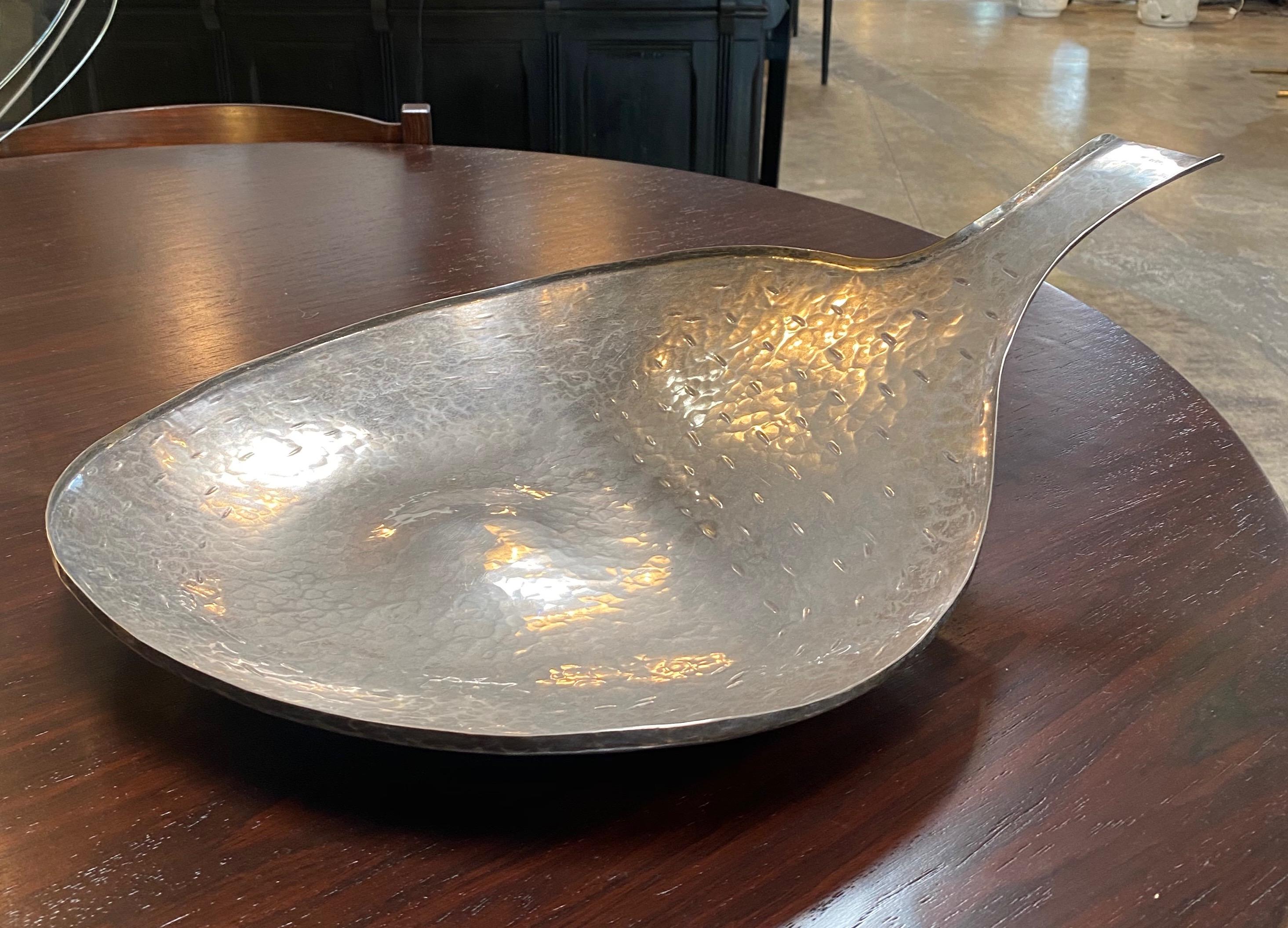 Italian hammered solid silver bowl or tray, 1950s
Unique oval shaped with a single handle .