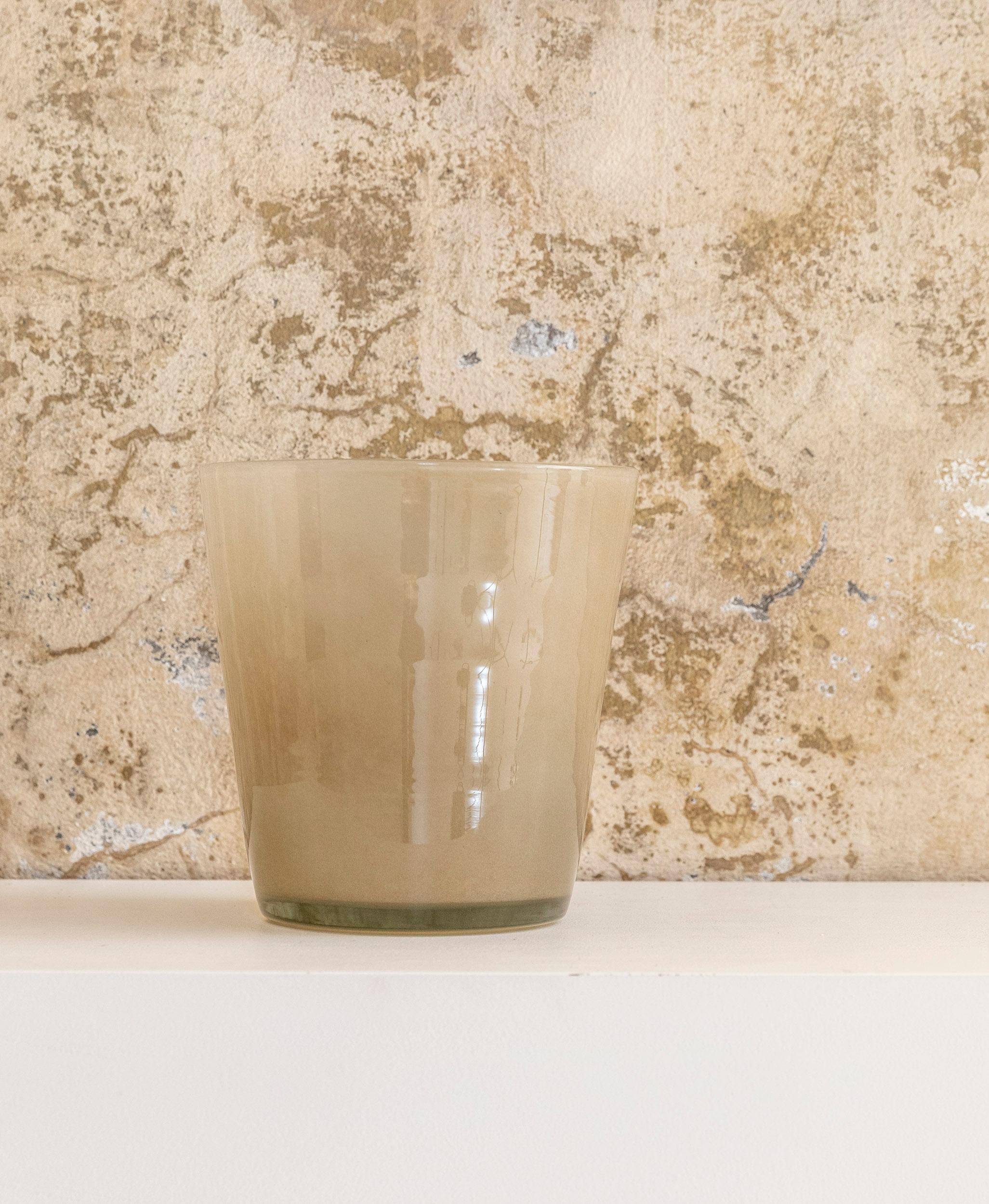 Beautiful hand blown murano glass vase in the shade of amber. 
Handmade in Italy in 1960 circa.