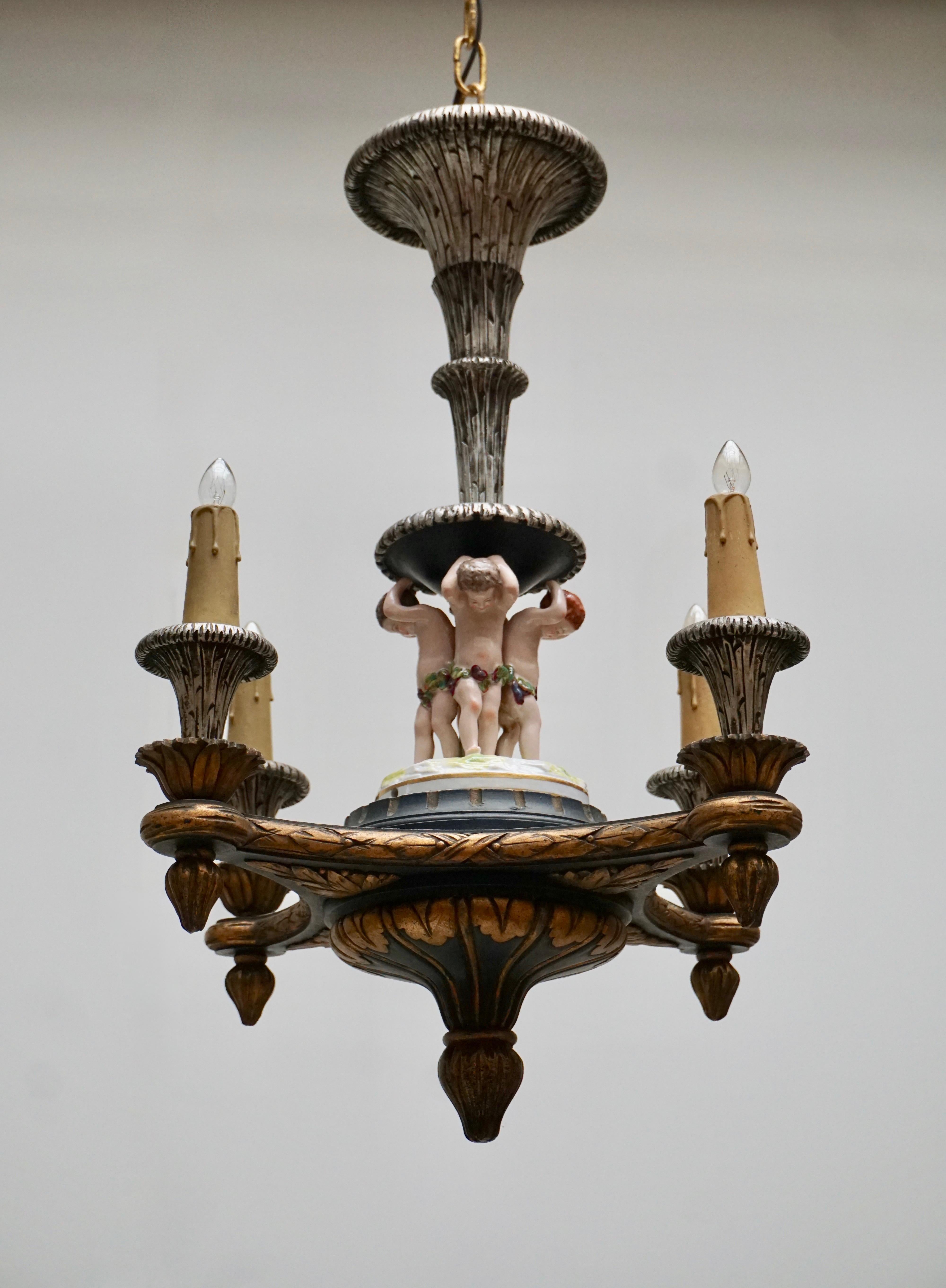 Hollywood Regency Italian Hand-Carved Chandelier with Porcelain Putti For Sale