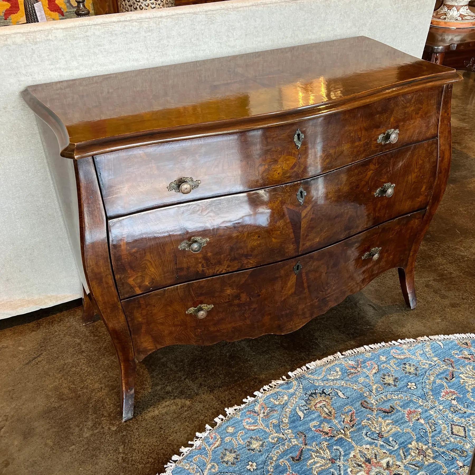 Genoese Baroque Style chest in olive ash wood inlaid with limewood, rosewood, and tulipwood representing the 