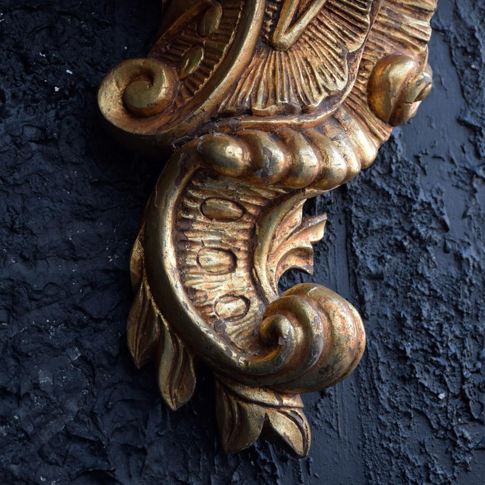 Gold gilt wall Corbels
We are proud to offer a rare matched pair of hand carved sectioned oak gold gilt wall Corbels. These items are made from section piece hand carved oak and still with their original gold gilt painted surface. The reverse of
