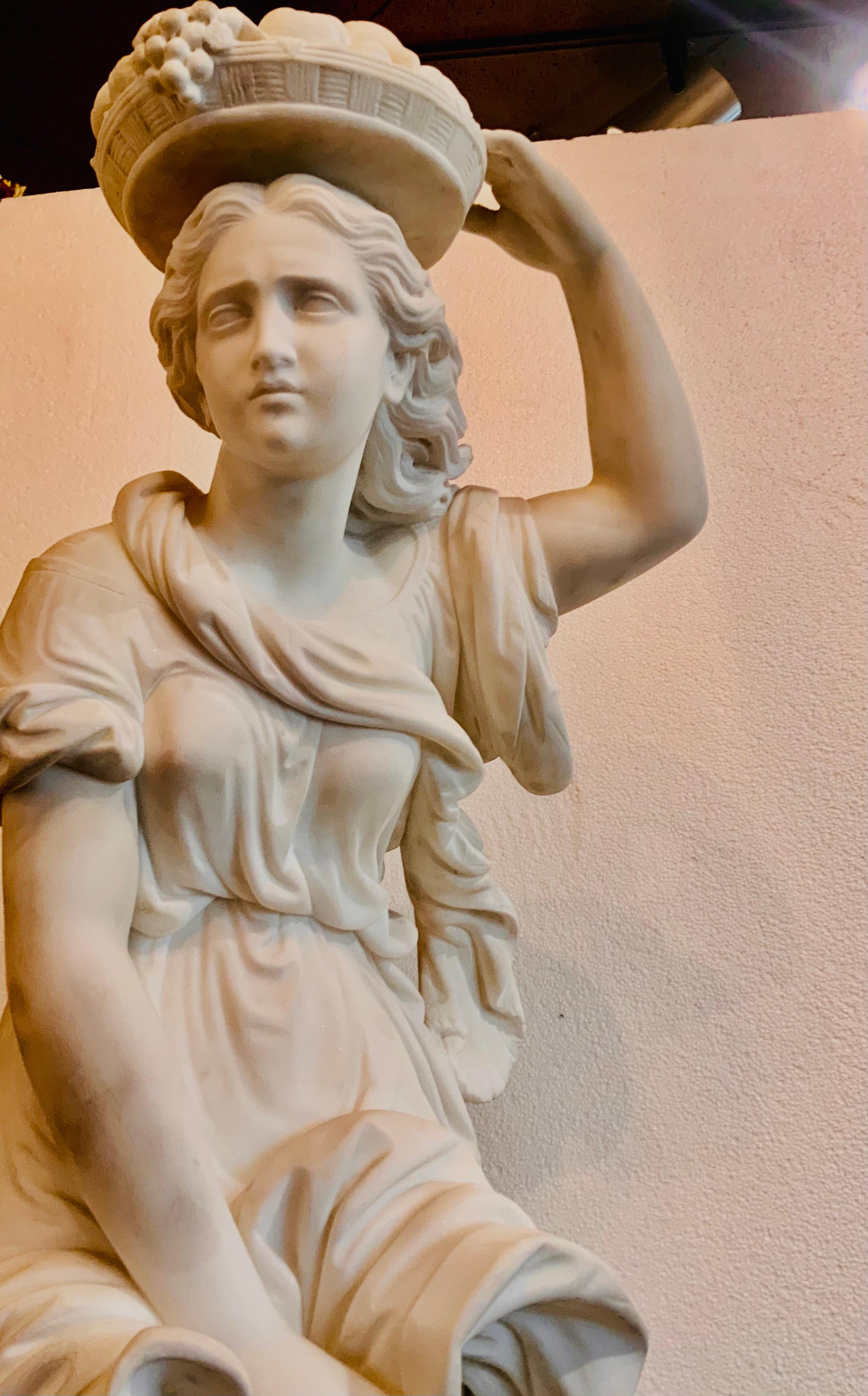 19th Century Italian Hand Carved Marble Sculpture of a Maiden Holding a Basket of Fruit  For Sale