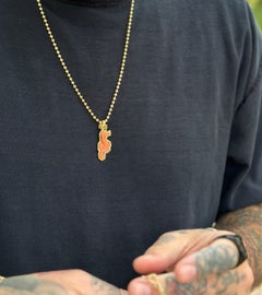 Italian Hand-Carved Natural Coral Seahorse and 18karat Yellow Gold Pendant