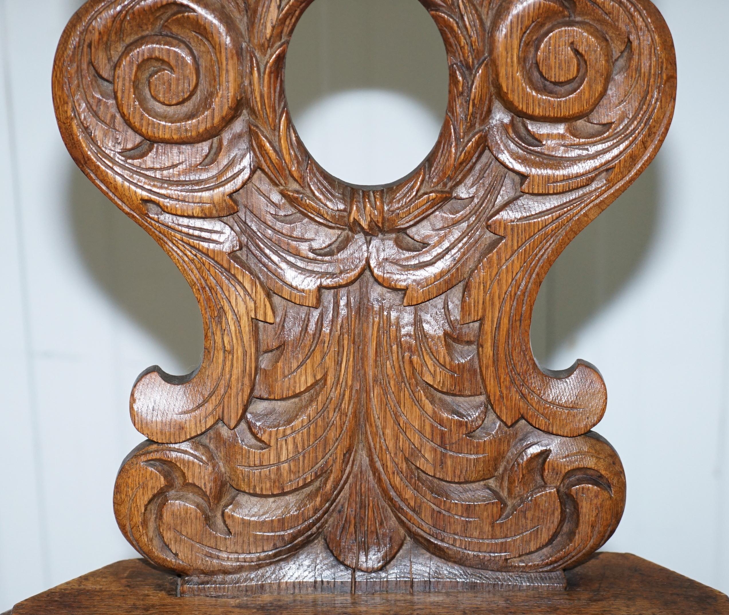 Hand-Carved Italian Hand Carved Oak Hall Chair with Ornate Wood Floral Cresting Back Rest