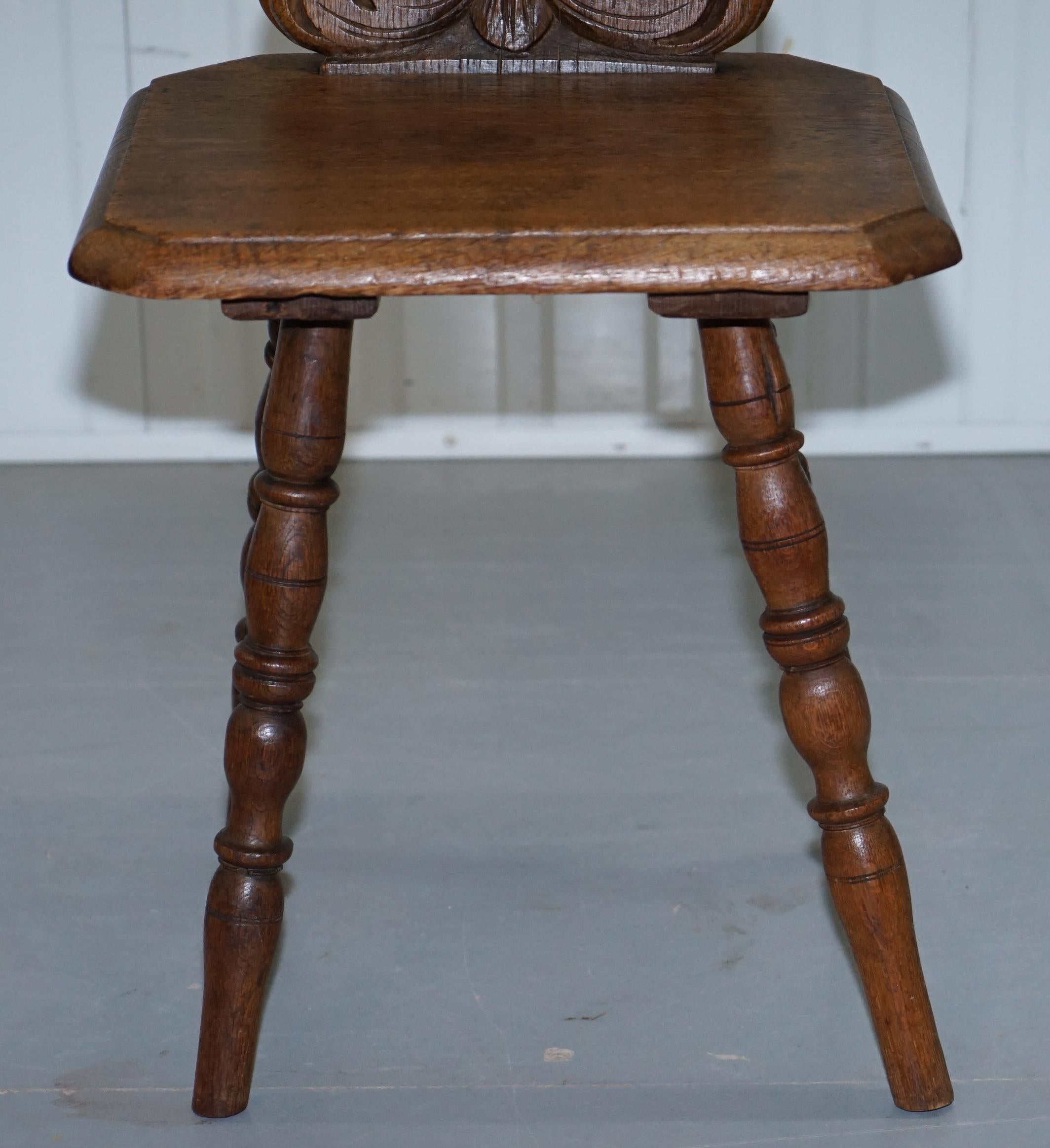 Late 19th Century Italian Hand Carved Oak Hall Chair with Ornate Wood Floral Cresting Back Rest