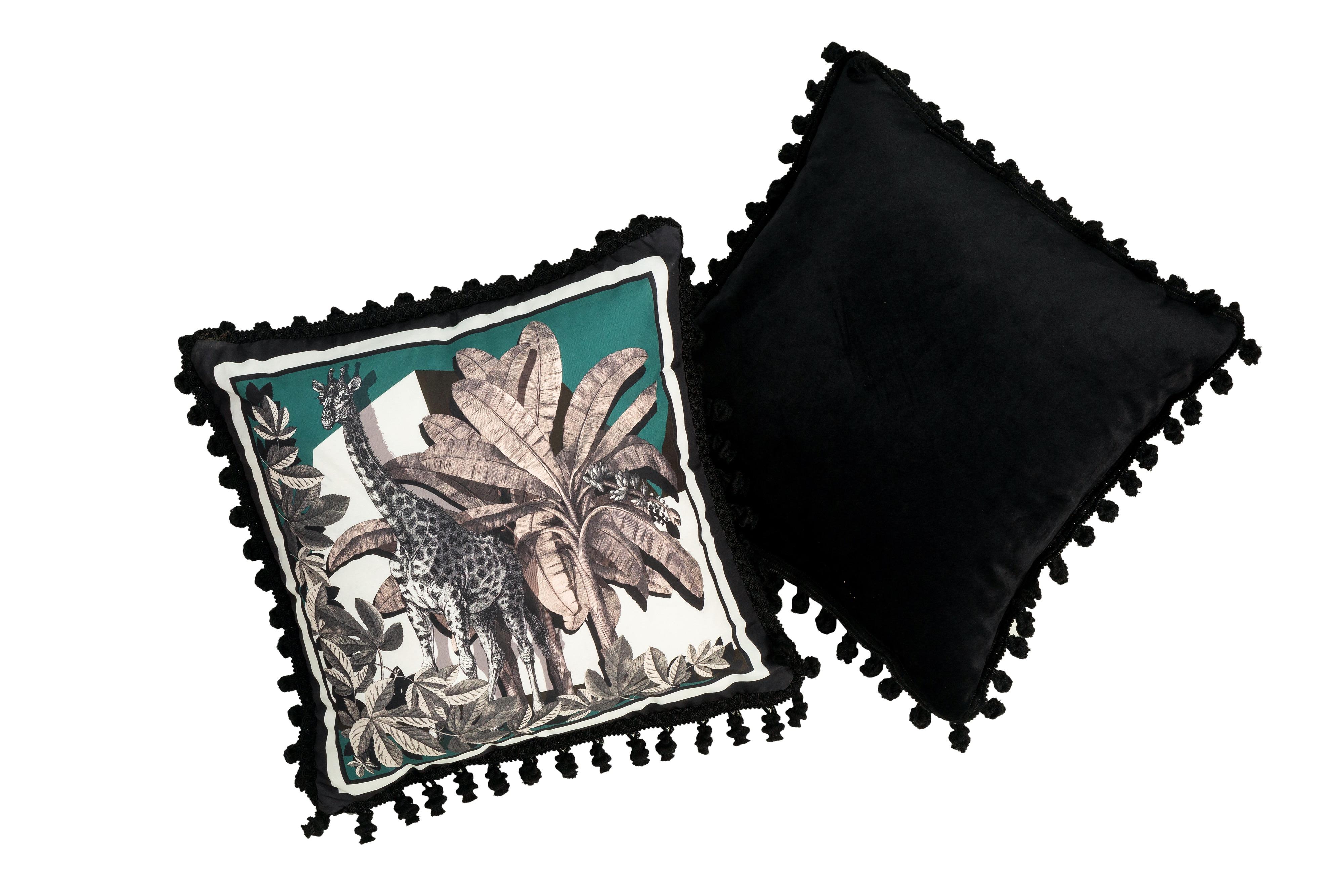 A velvet and polyester pillow with black trimmings from the 