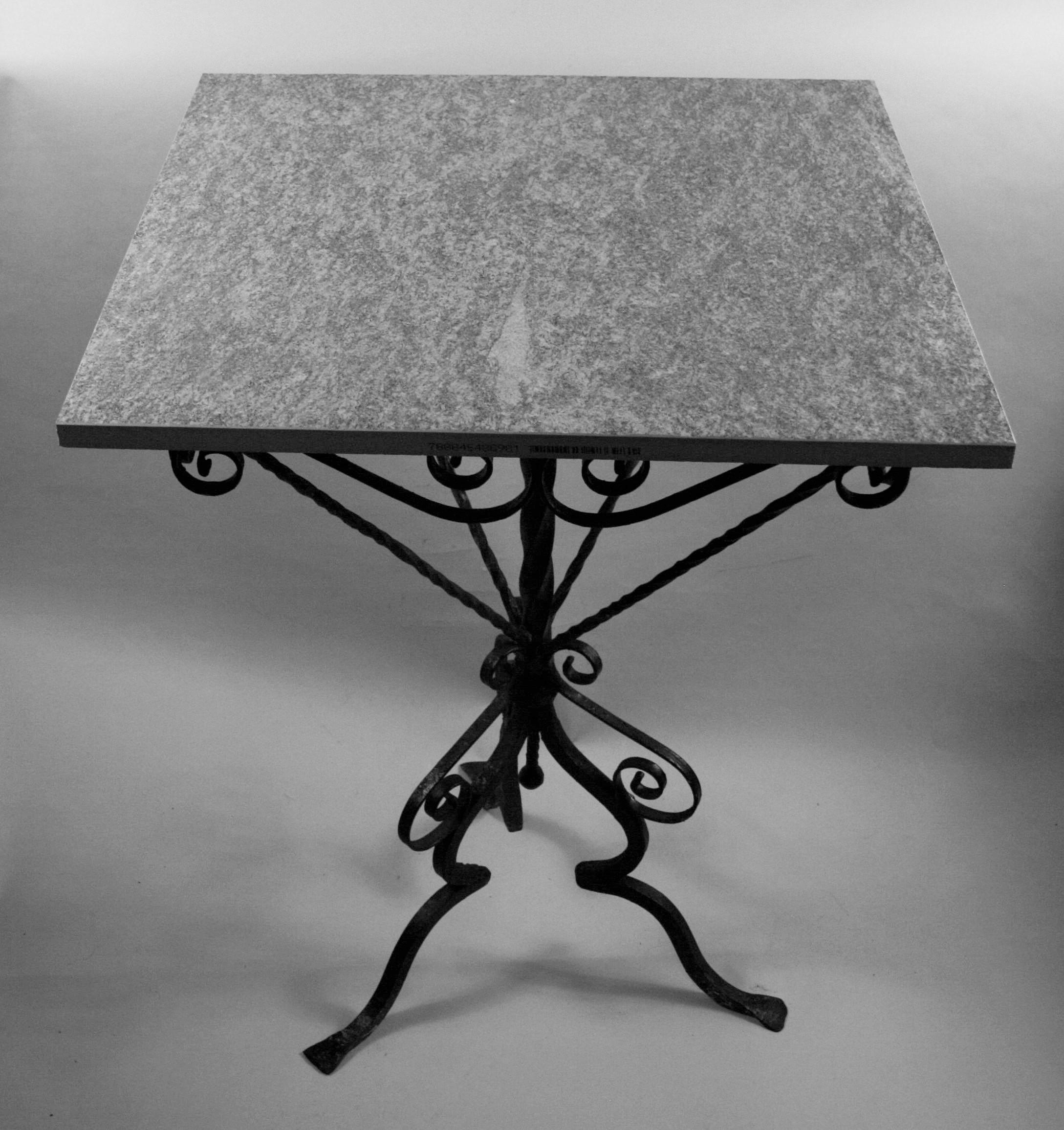 3-625 Italian hand made scrolled iron base with new ceramic top.