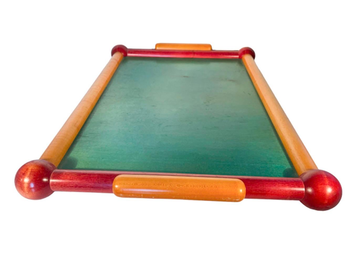Hand crafted stained hardwood serving tray. Handcrafted in Bergamo, Italy using translucent colored stains on select hardwoods and incorporating geometric forms to create the frame, feet and handles. Marked on the bottom 